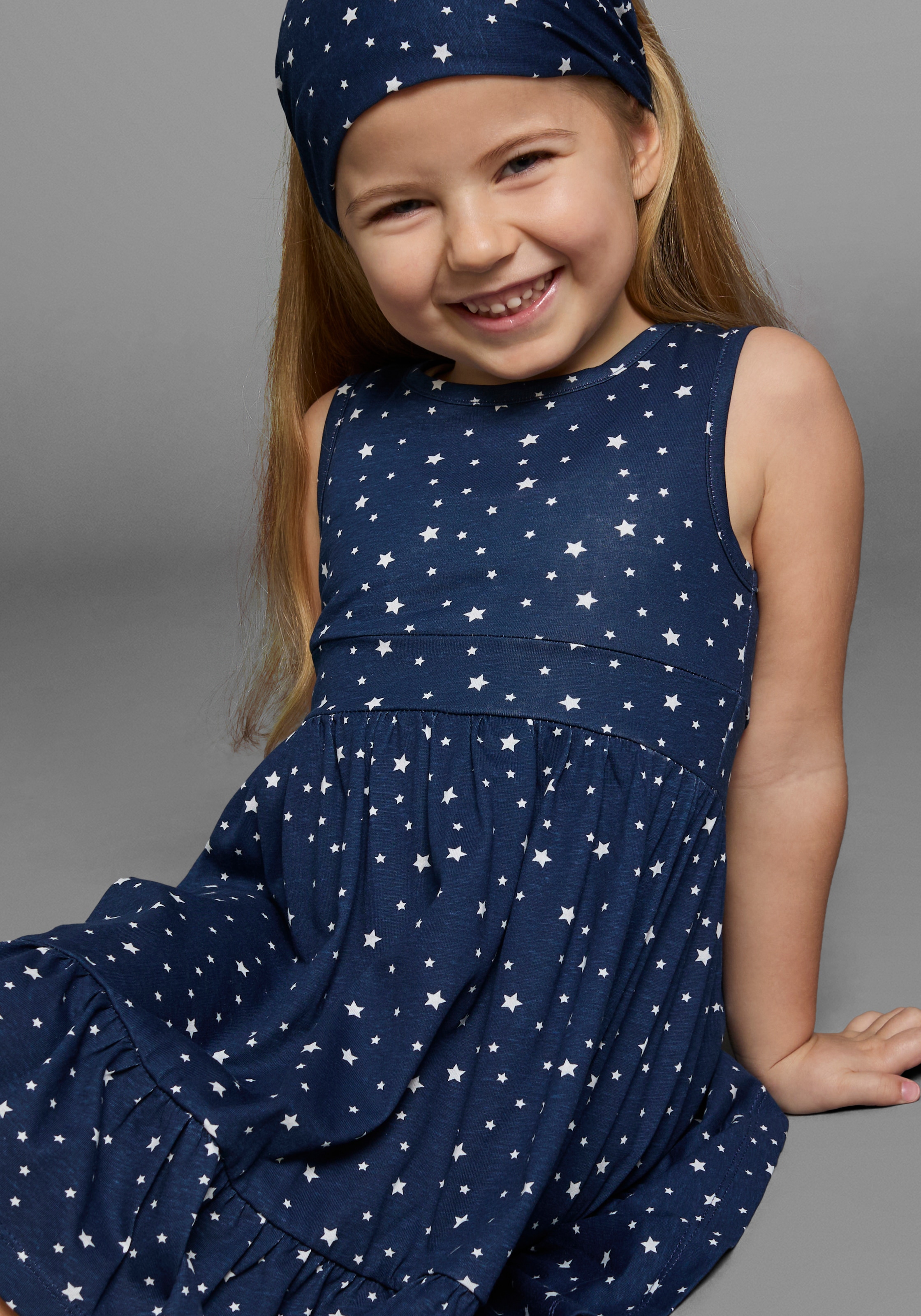 KIDSWORLD Jerseykleid »2tlg. Shirtkleid + Haarband im niedlichen Sternen-Allover«, (Set, 2 tlg.), festliche Anlässe, knielang, verspielter Stil, aus Baumwolle