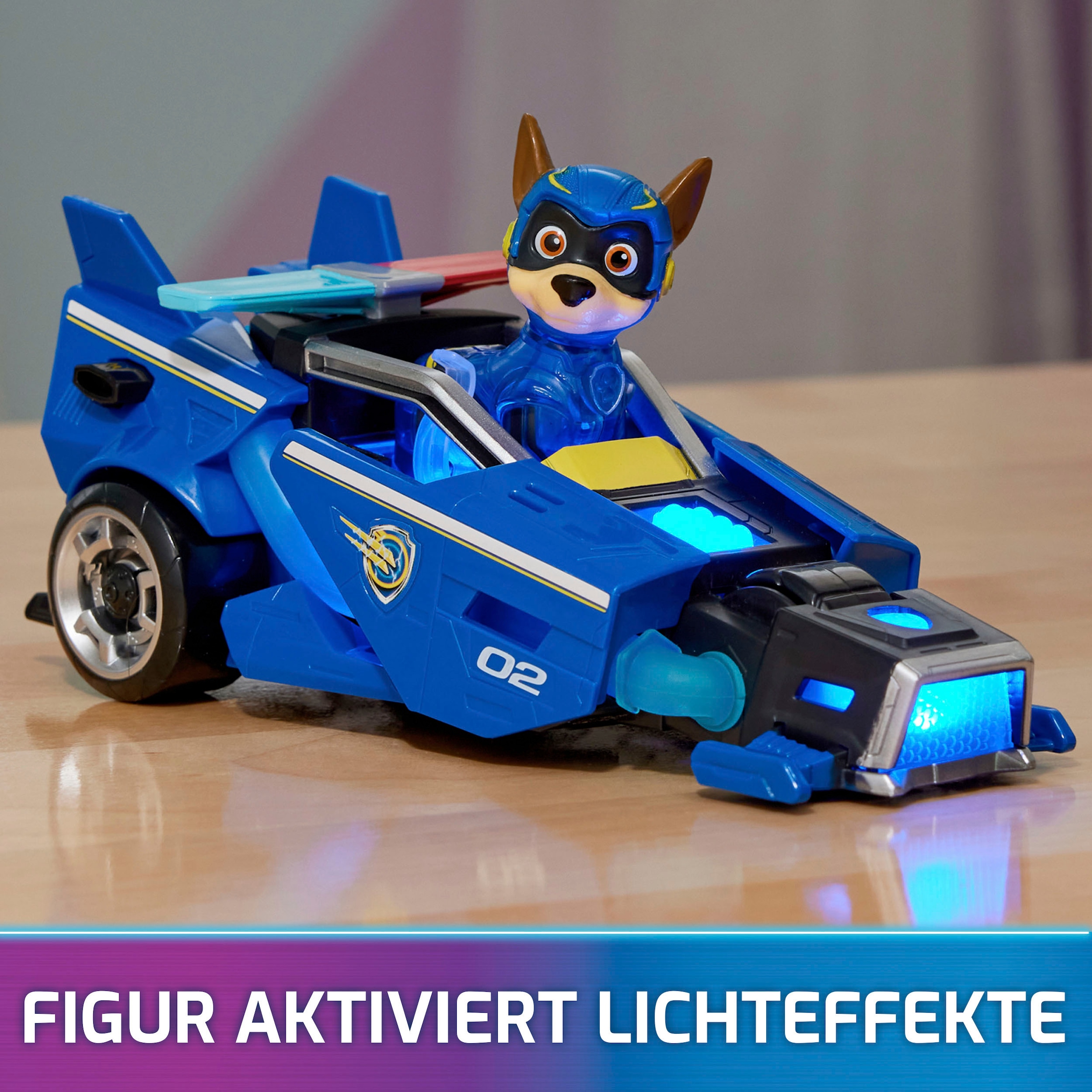 Spin Master Spielzeug-Auto »Paw Patrol - Movie II - Basic Themed Vehicles Chase«, Polizeiauto mit Welpenfigur, Licht- und Soundeffekt