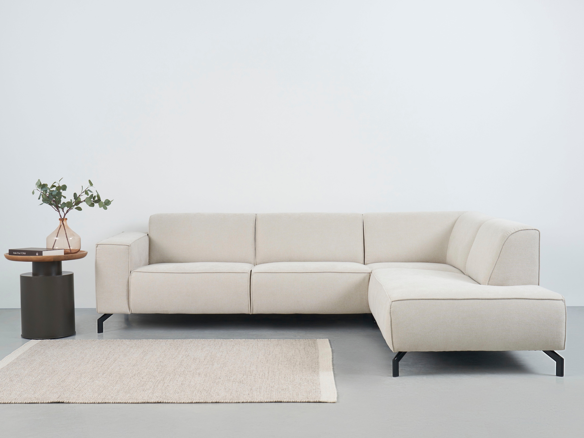 Places of Style Ecksofa Lorcan, in Lederoptik oder Strukturstoff lieferbar