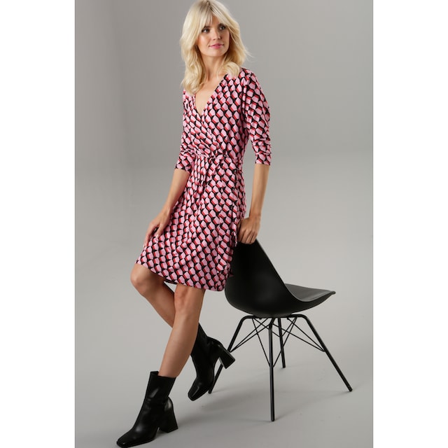 Aniston SELECTED Jerseykleid, mit Allover-Muster und Ausschnitt in  Wickeloptik bei ♕