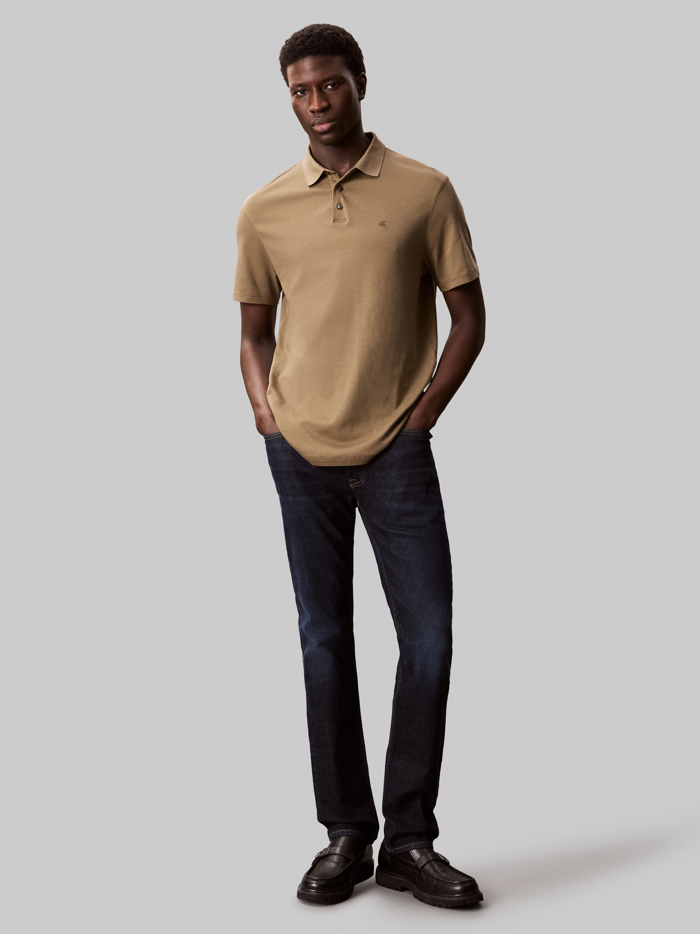 Calvin Klein Poloshirt »SS SUPIMA CHEST EMB POLO«, Mit Rundhalsausschnitt