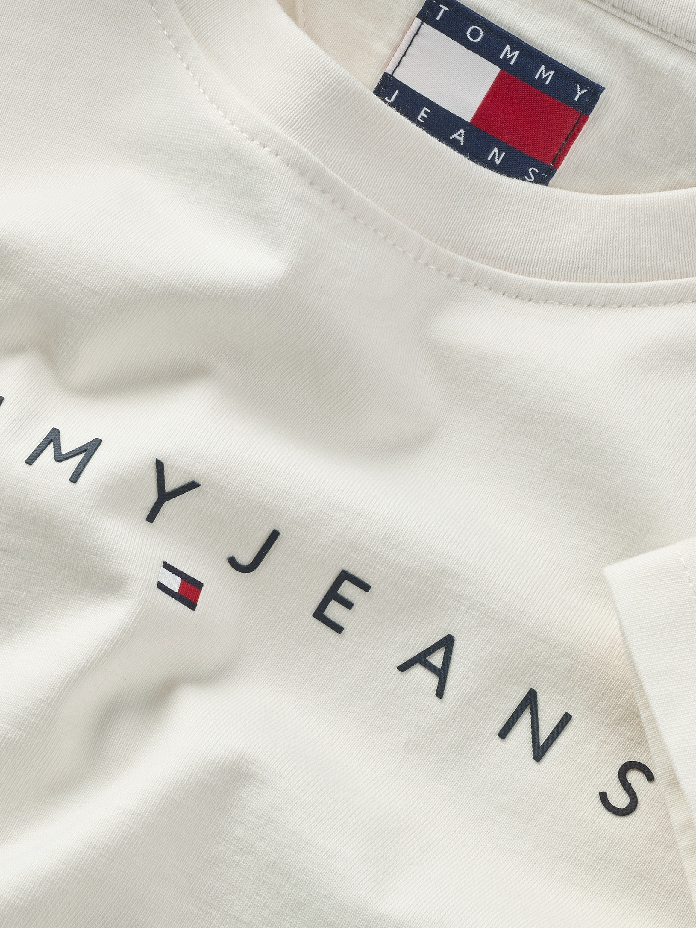 Tommy Jeans Langarmshirt »TJW SLIM LINEAR TEE LS EXT«, mit Logoschriftzug