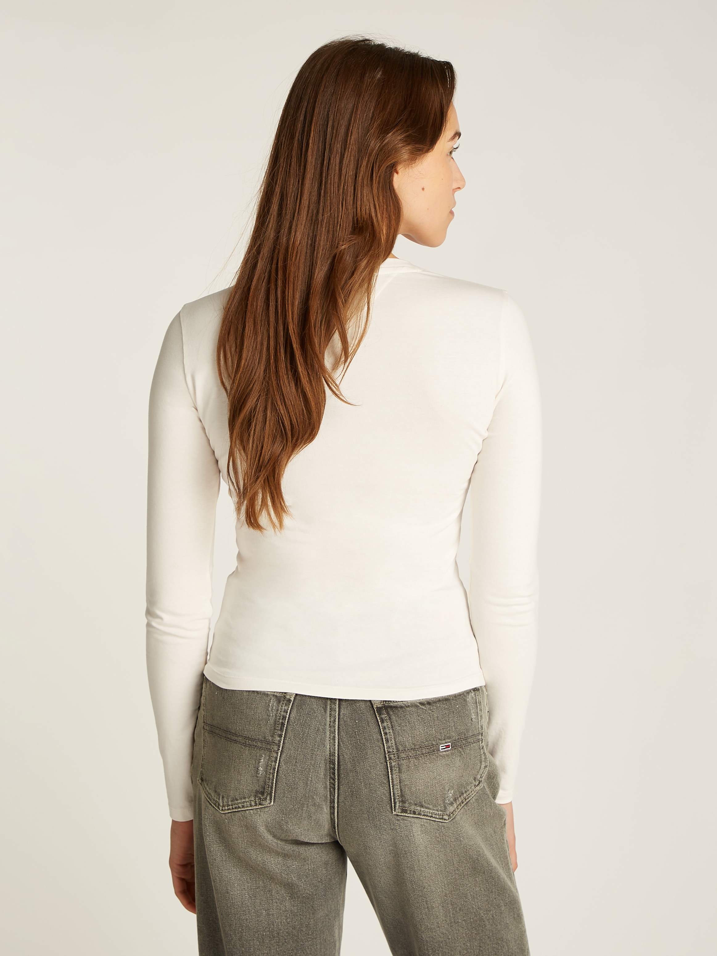 Tommy Jeans Langarmshirt »TJW SLIM LINEAR TEE LS EXT«, mit Logoschriftzug