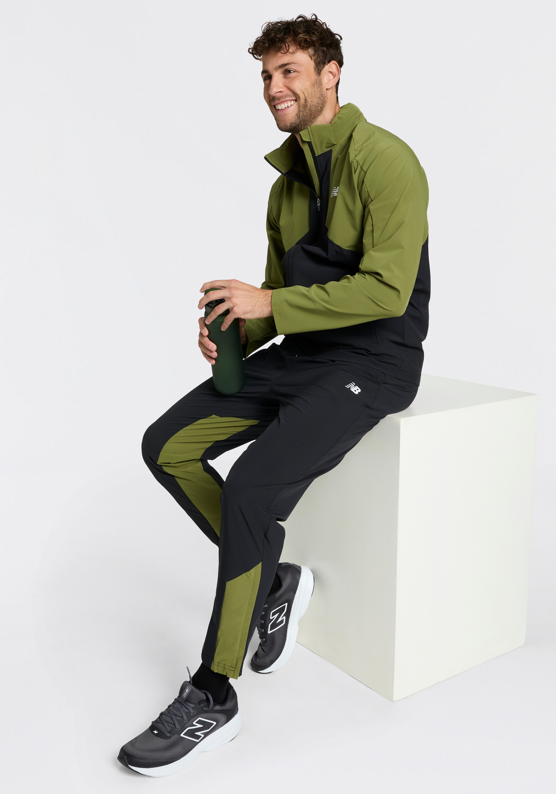 New Balance Trainingsjacke »UTILITY STRETCH WOVEN JACKET« Trainingsjacke für Fitness und sportliche Aktivitäten