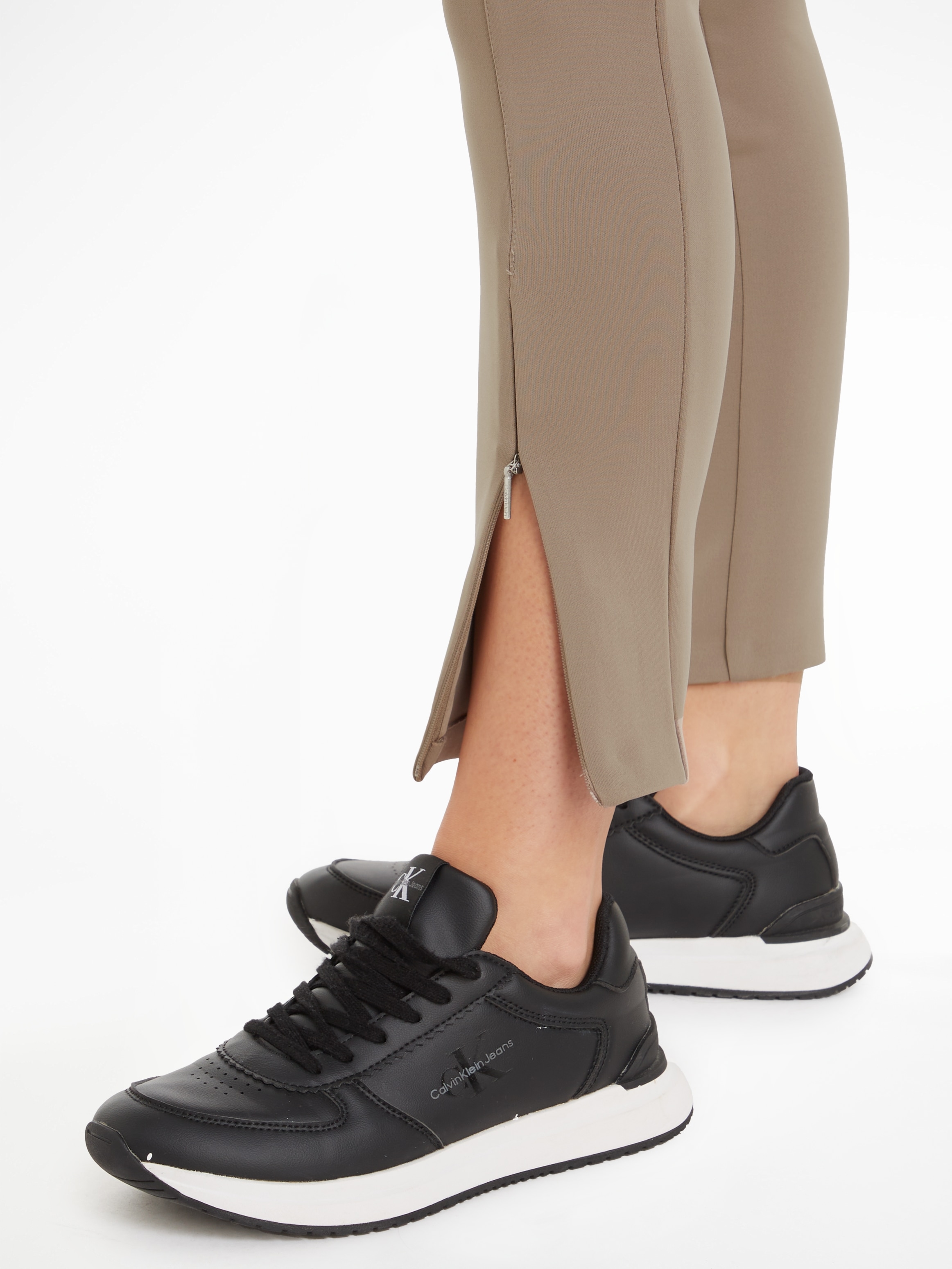 Calvin Klein Leggings »TECHNICAL KNIT LEGGING«, mit Reißverschluss am Beinabschluss