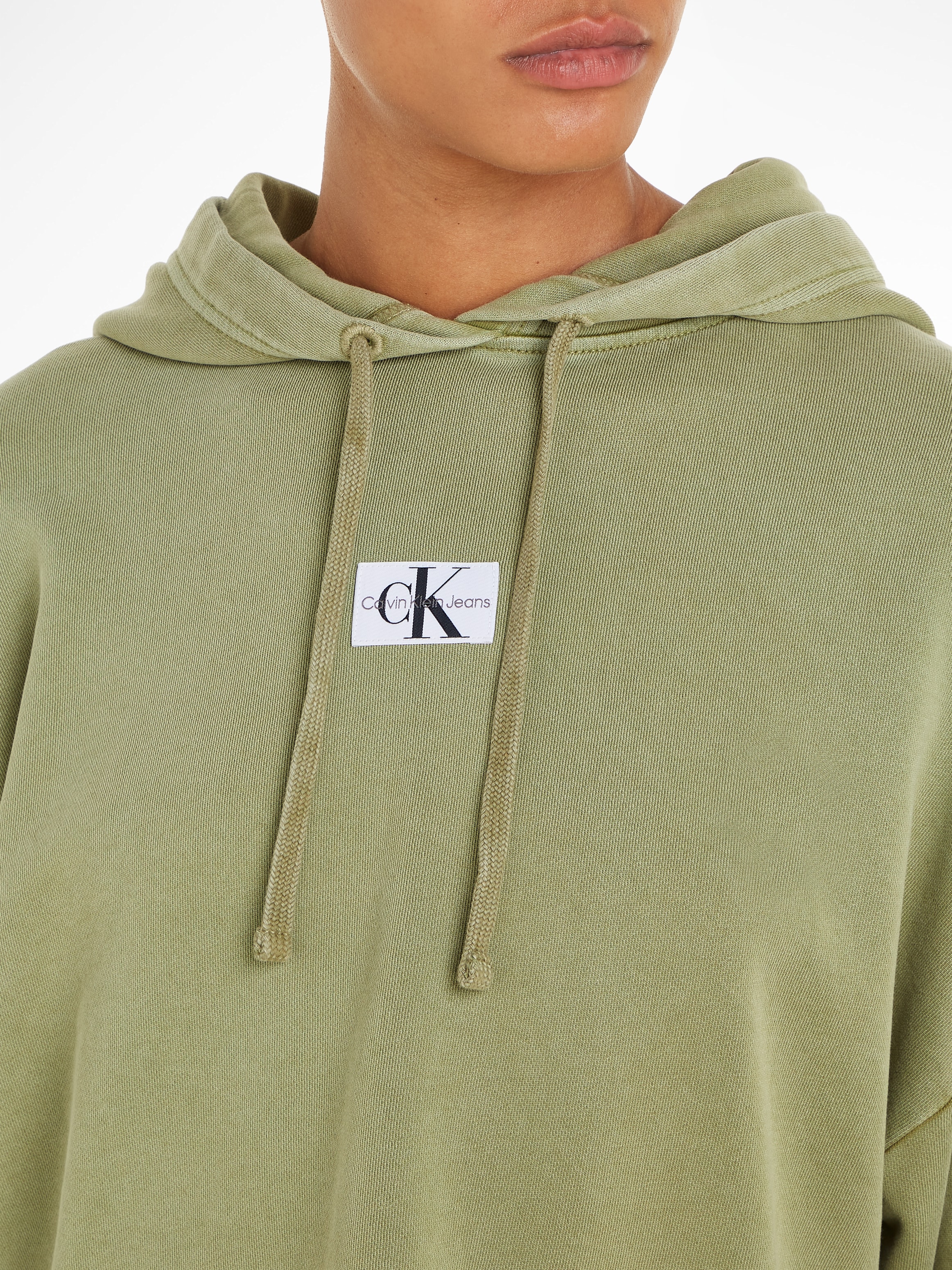 Calvin Klein Jeans Kapuzensweatshirt »WASHED WOVEN LABEL HOODIE«, mit Logoschriftzug