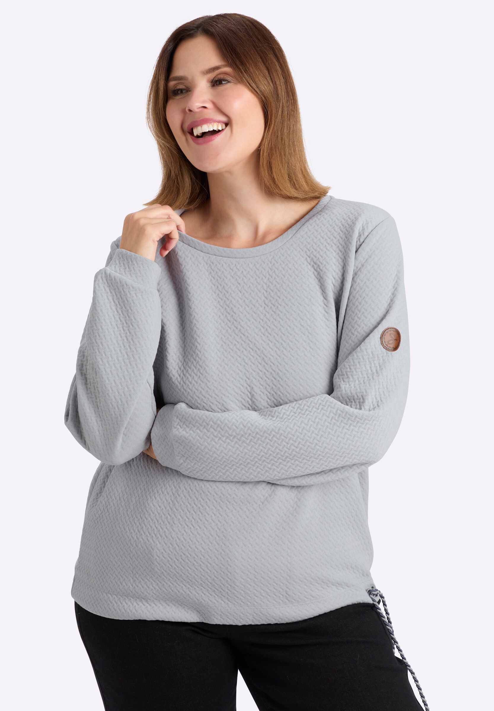 Sheego Sweatshirt »Sweatshirt Sweatshirt mit Ösen und gedrehtem Garn«
