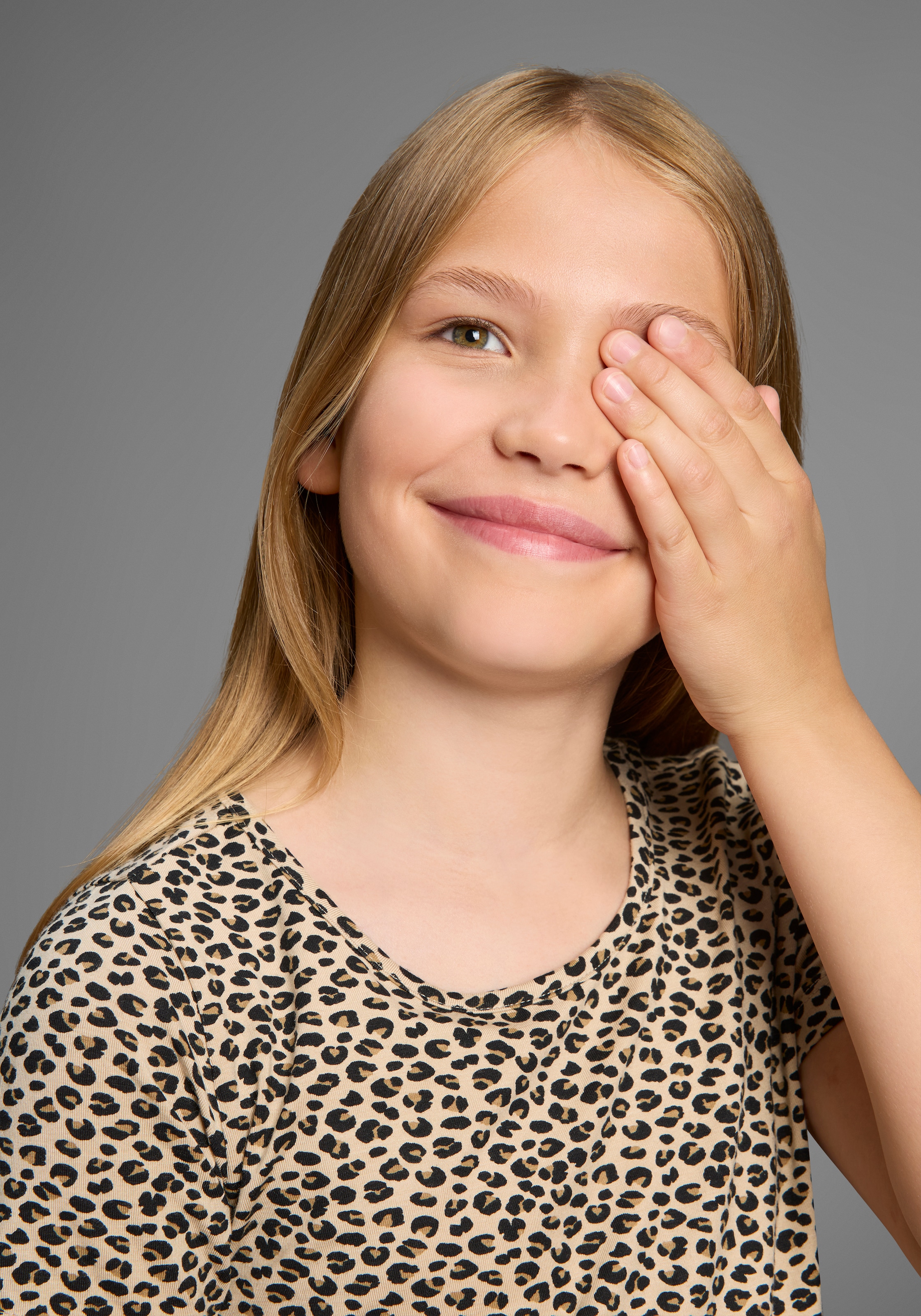 KIDSWORLD Jerseykleid »Shirtkleid in Leo-Musterung« Shirtkleid in Leo-Optik, unten austestellt