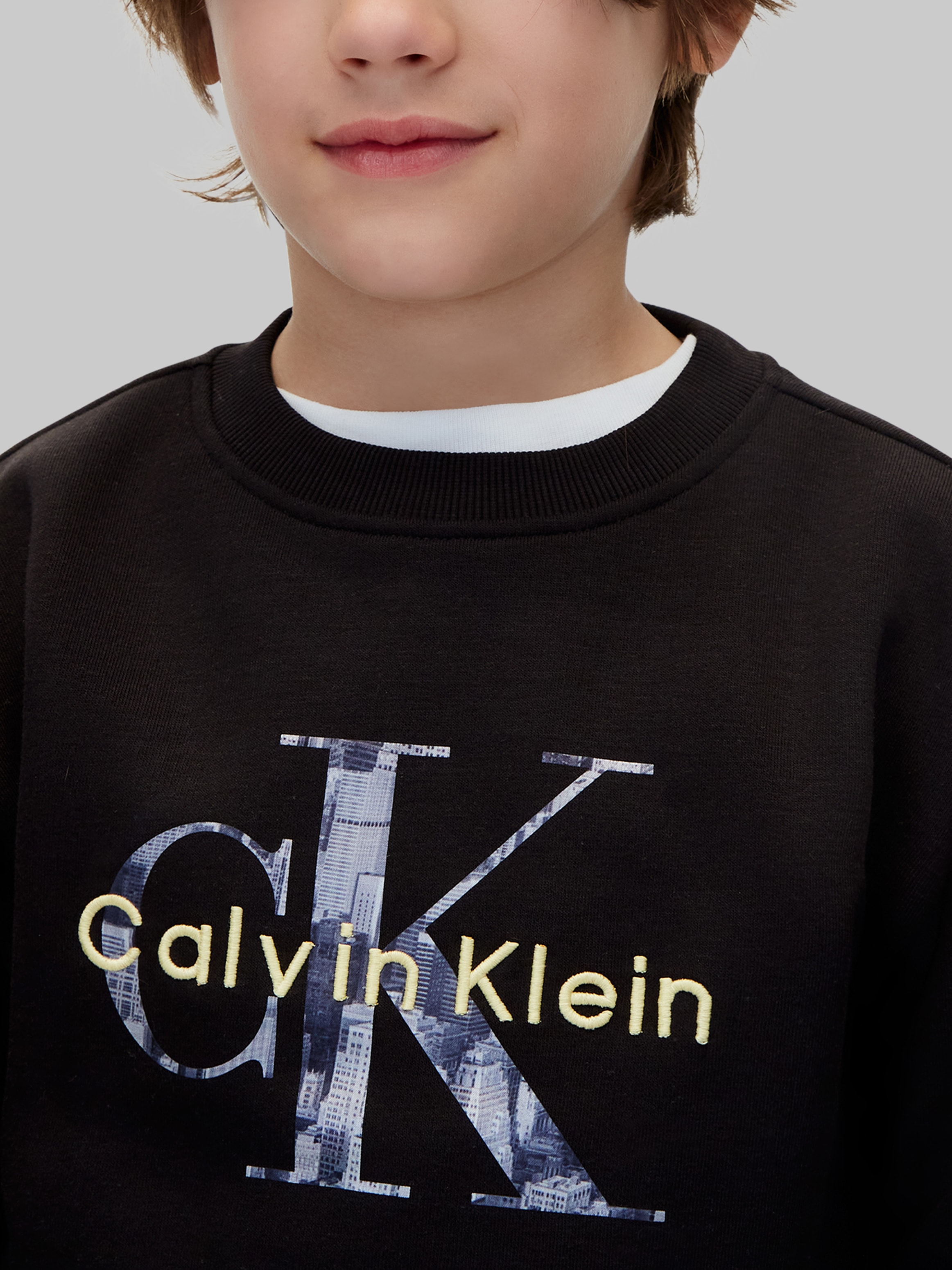 Calvin Klein Jeans Sweatshirt »FILLED MONOLOGO CN SWEATSHIRT«, Regular fit mit Rundhalsausschnitt, Logoschriftzug

