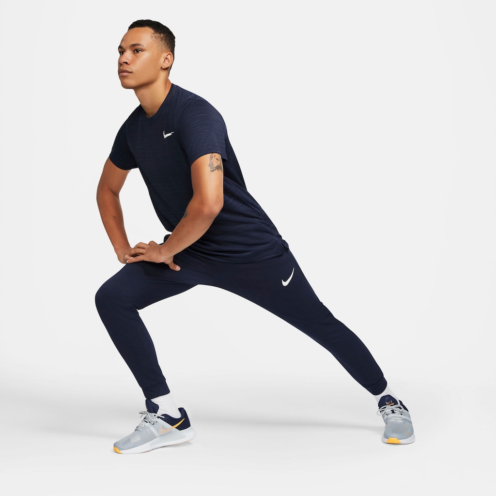 Nike Trainingshose »DRI-FIT MEN'S TAPERED TRAINING PANTS«