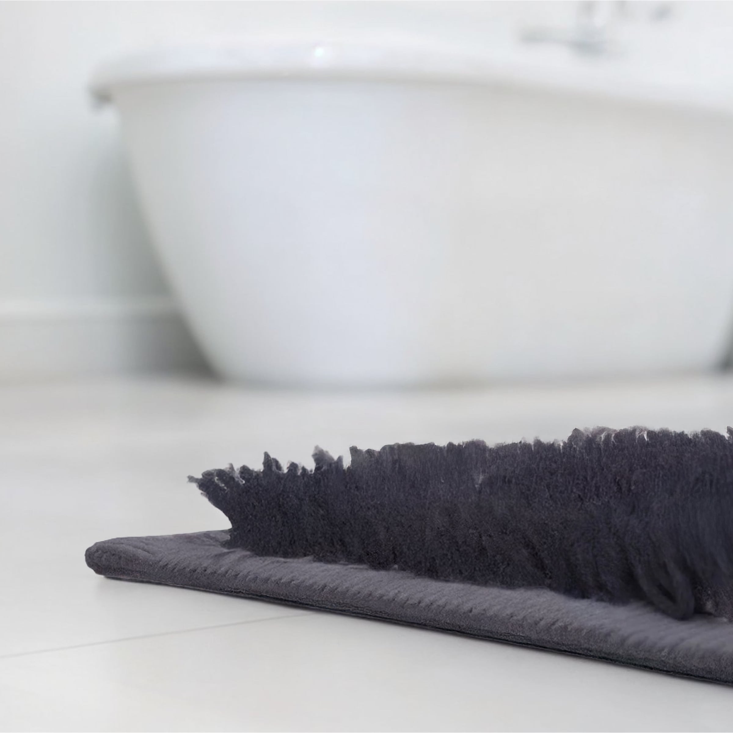 Grund Badematte »Umbria« Höhe 20 mm rutschhemmend beschichtet fußbodenheizungsgeeignet Modernes Blättermuster in Black oder Taupe,  5 Jahre Garantie