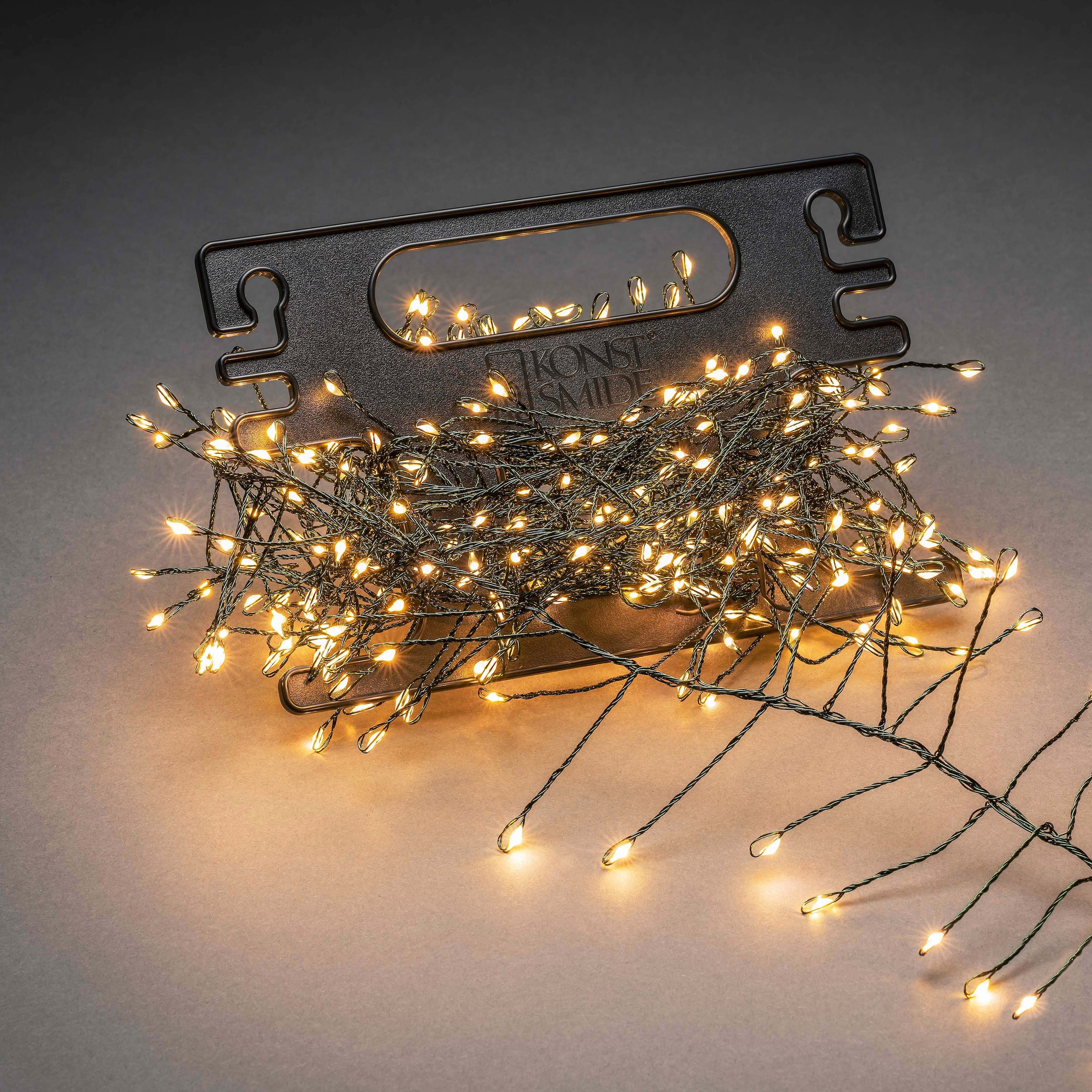 KONSTSMIDE LED-Lichterkette »Weihnachtsdeko aussen«, 400 St.-flammig, Micro LED Büschellichterkette Cluster, mit Aufroller