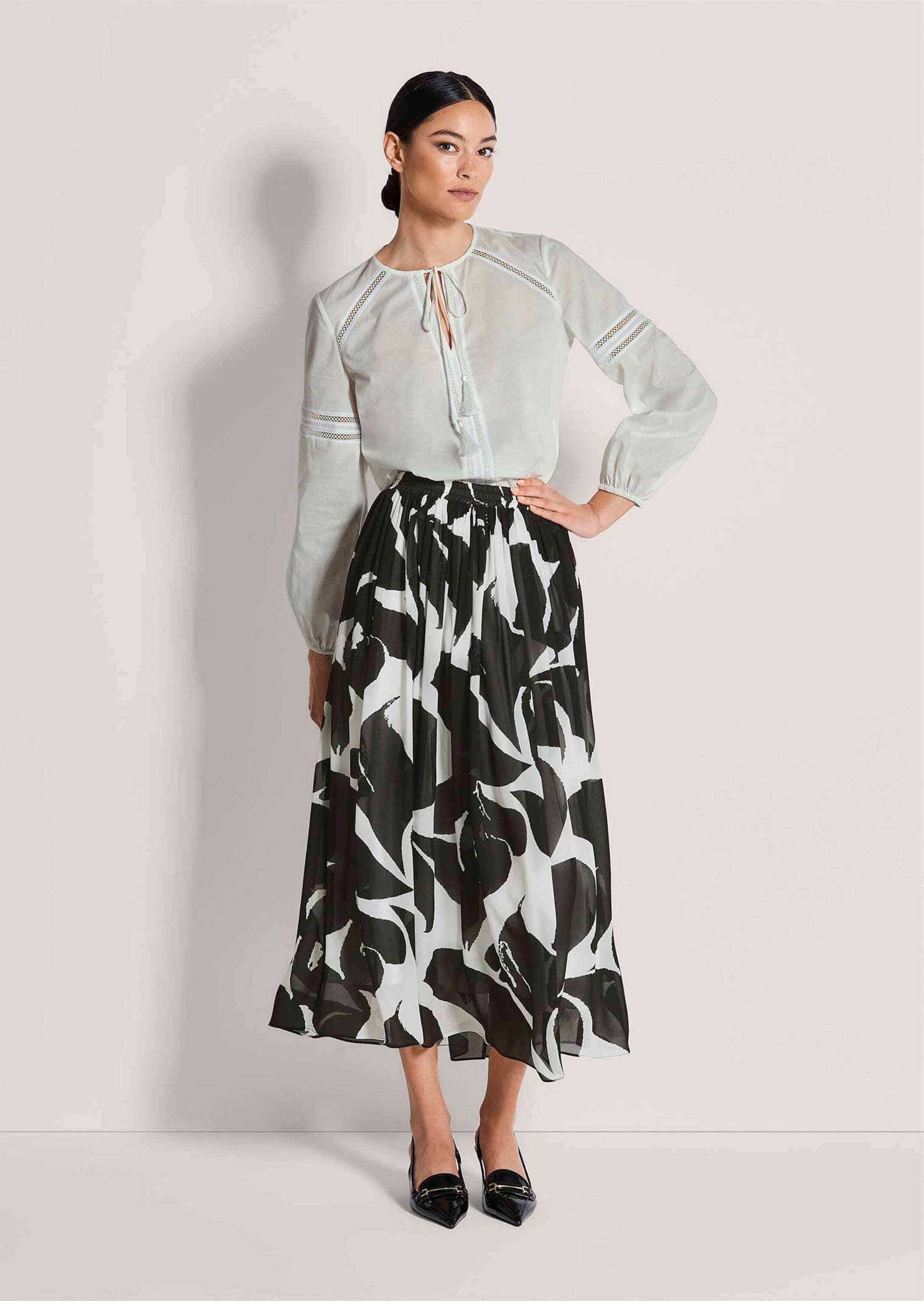 MADELEINE Midirock »Midirock Druckrock mit floralem Muster« Nahttaschen