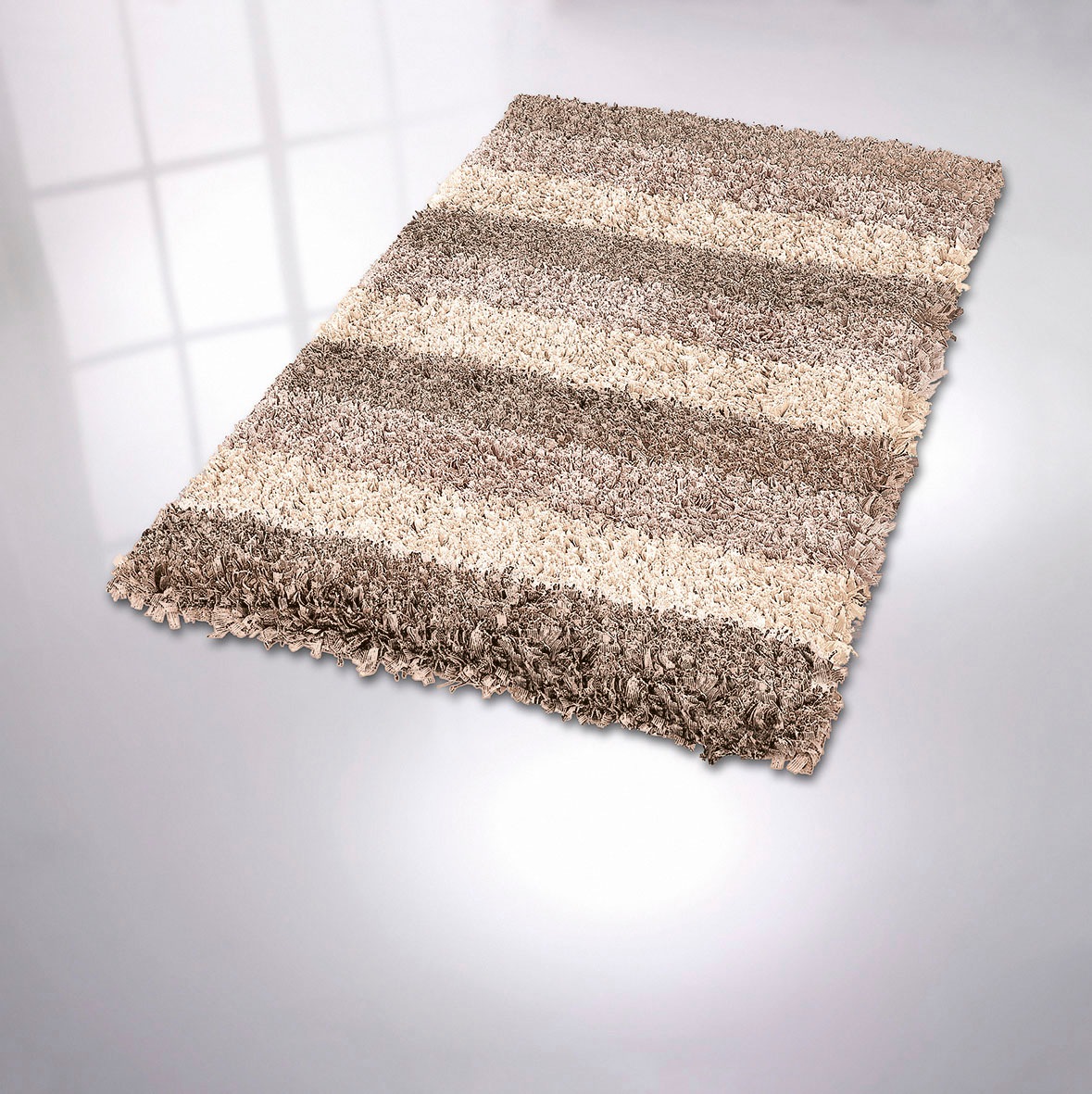 Kleine Wolke Badematte »Lounge«, rutschhemmend beschichtet, fußbodenheizungsgeeignet, Badteppich, Fransenflor, gestreift, leichter Glanzeffekt, waschbar
