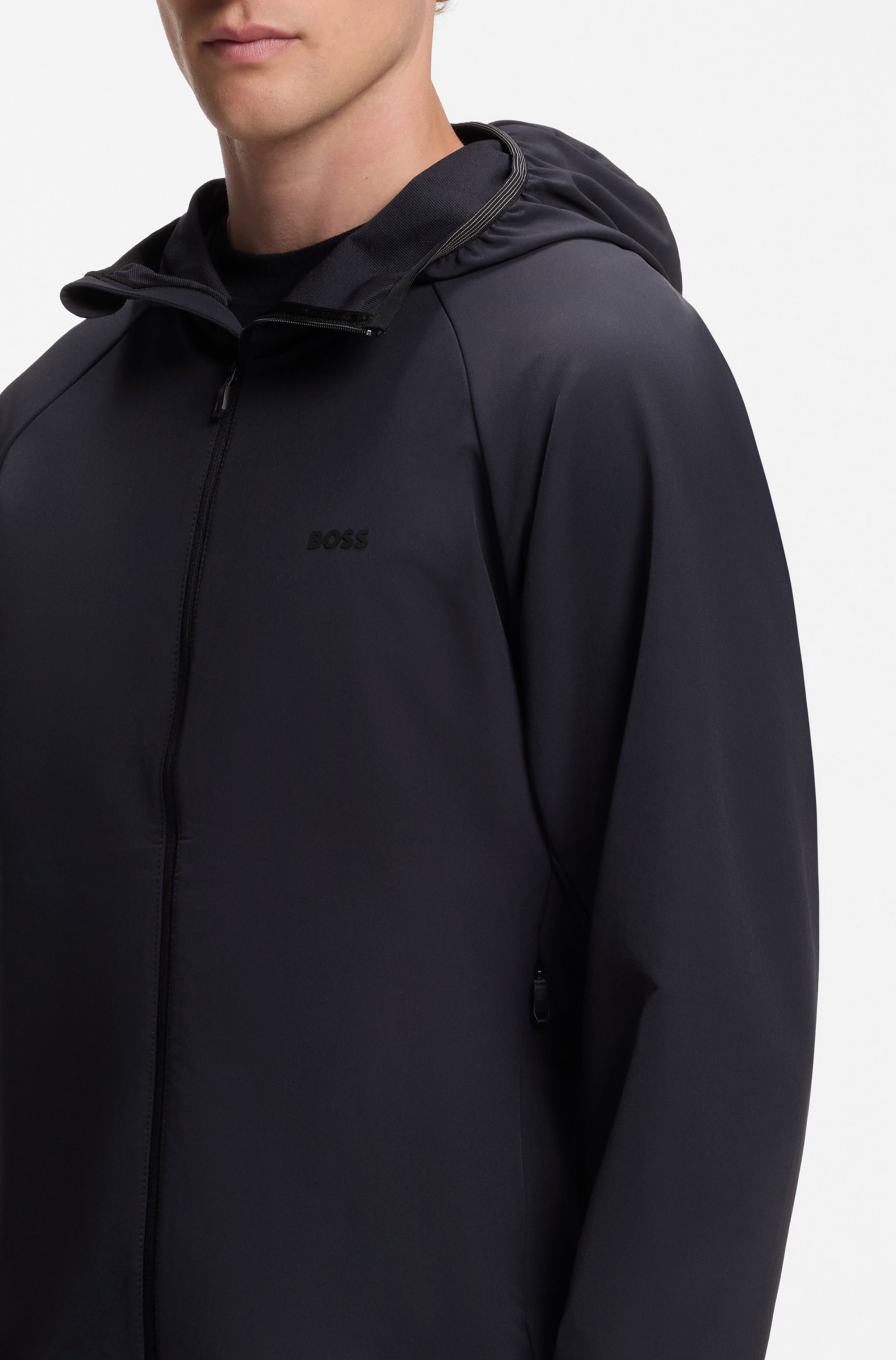 BOSS GREEN Funktionsjacke »L Commuter« mit Kapuze wasserabweisend Funktionsjacke mit gummiertem Label 4 Wege Stretch