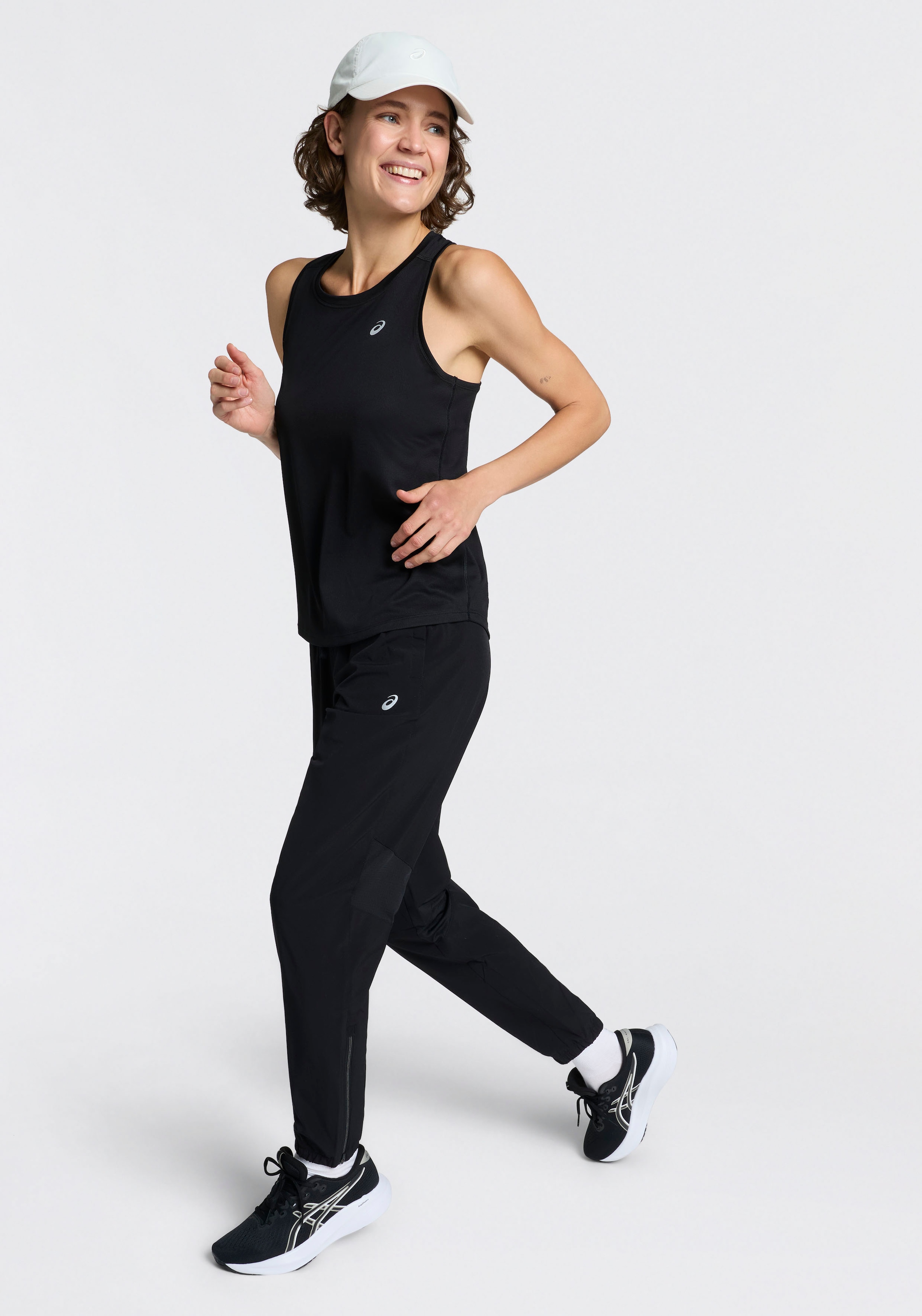 Asics Laufhose »ASICS CORE WOVEN PANT«  Schnelltrocknend, Reflektierend, Smartphone-Fach