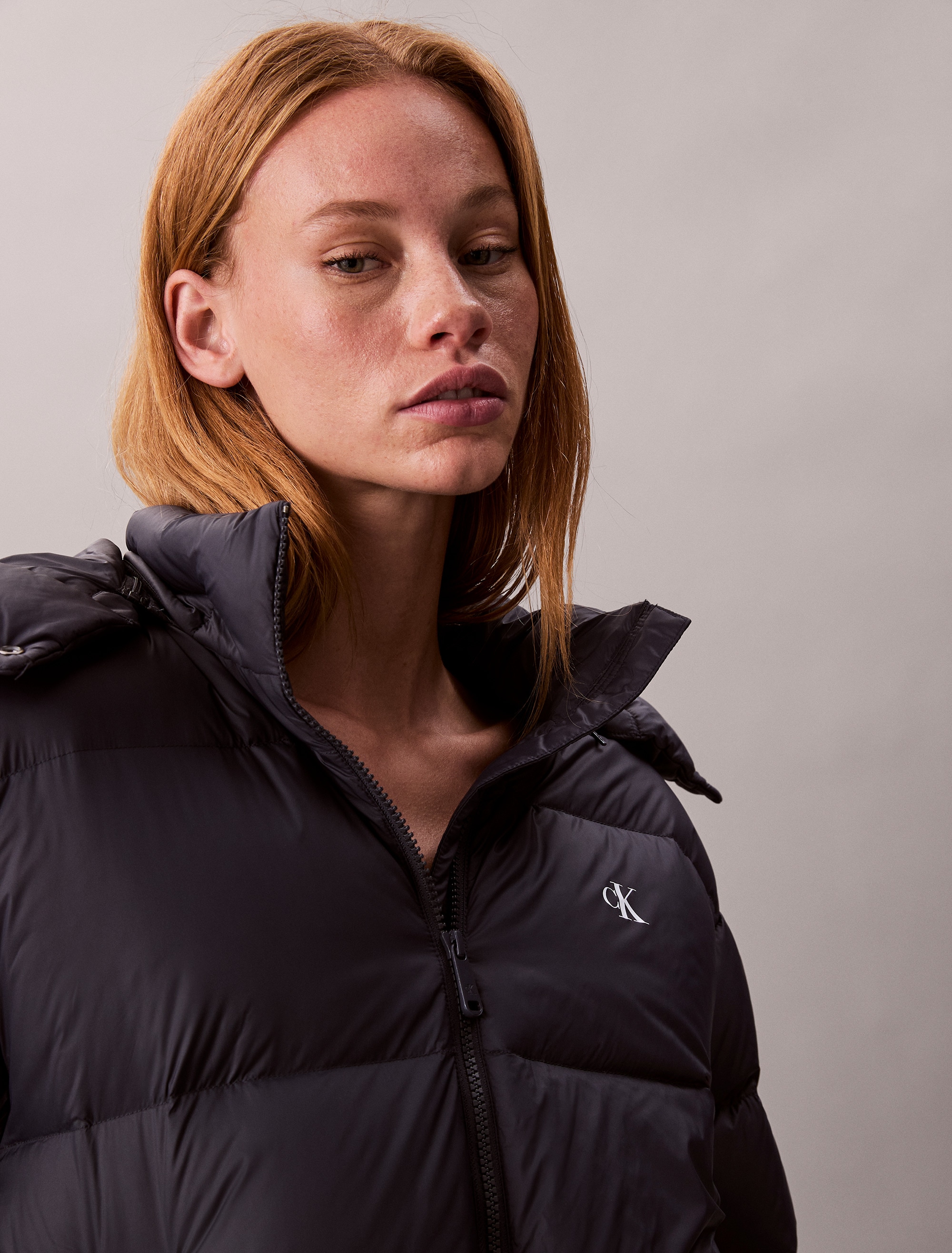 Calvin Klein Jeans Steppjacke »ESSENTIAL MIDWEIGHT PUFFER JACKE« mit Kapuze Mit Rundhalsausschnitt, regular fit