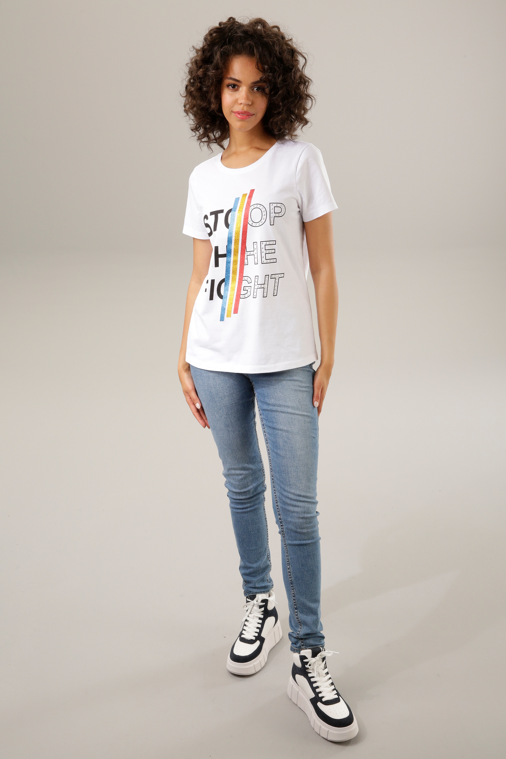 Aniston CASUAL Print-Shirt, mit bunten Glitzerstreifen, Nieten und  Schriftzug bei ♕
