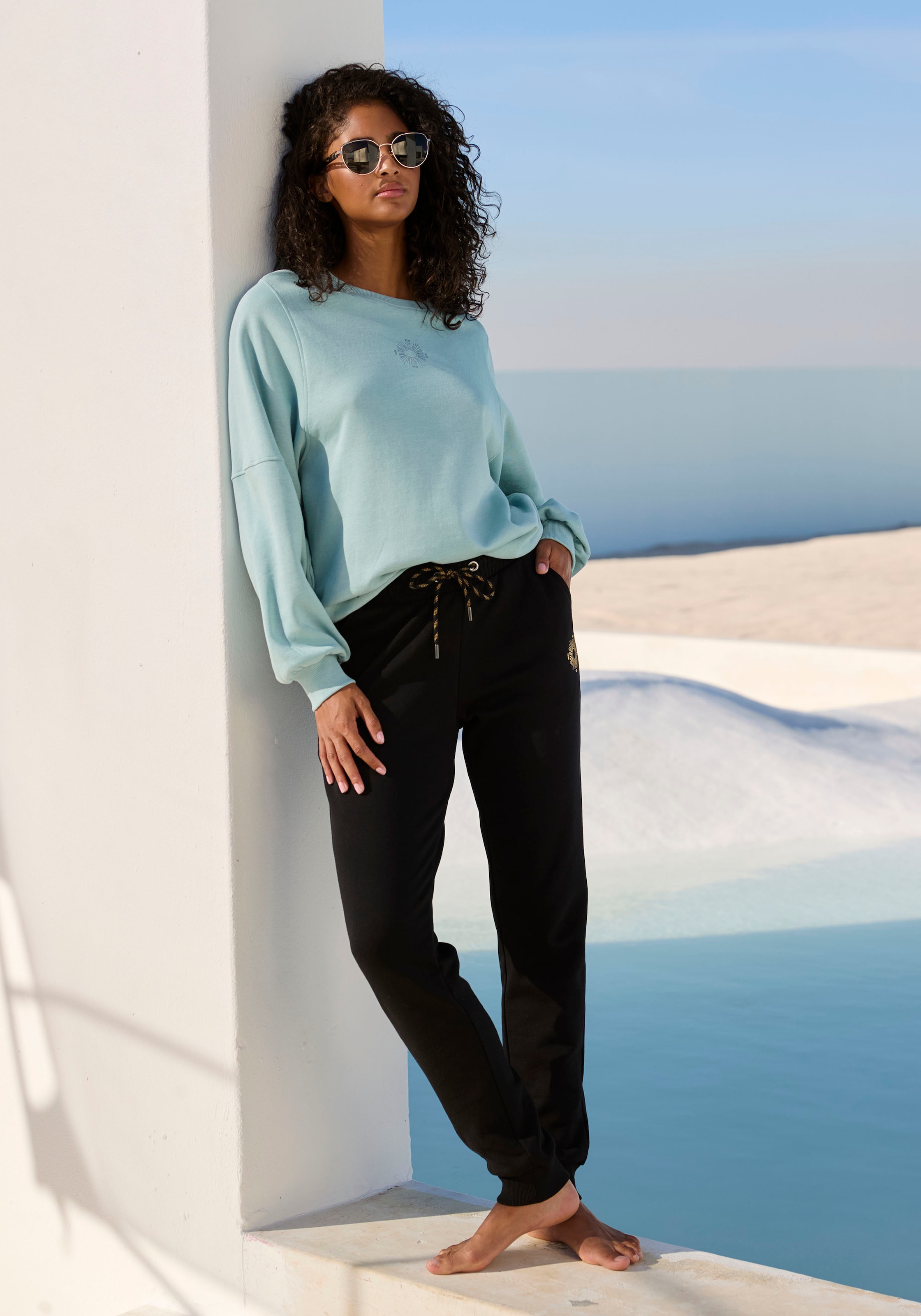 Buffalo Sweathose, Loungehose mit seitlichen Taschen und kleinem Druck, Loungewear