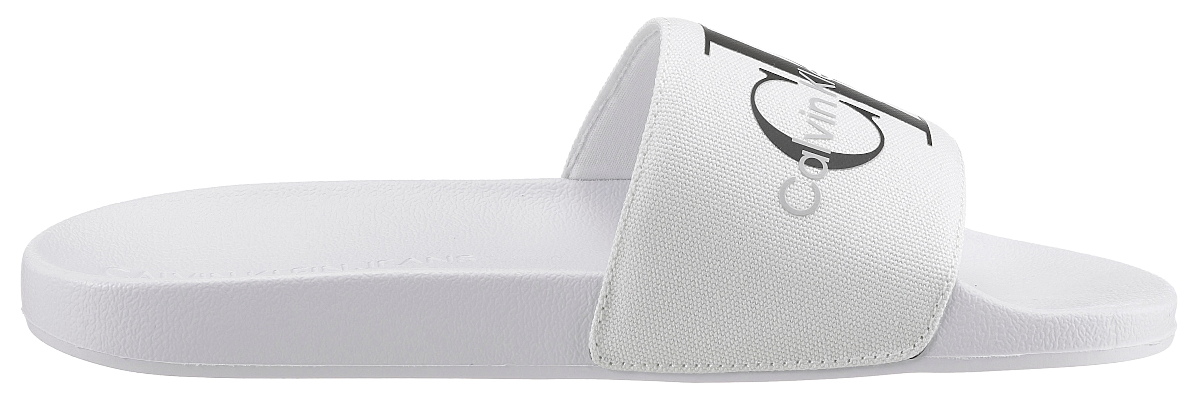 Calvin Klein Jeans Pantolette, Sommerschuh, Schlappen, Poolslides, mit auffälligem Logo, E-Weite