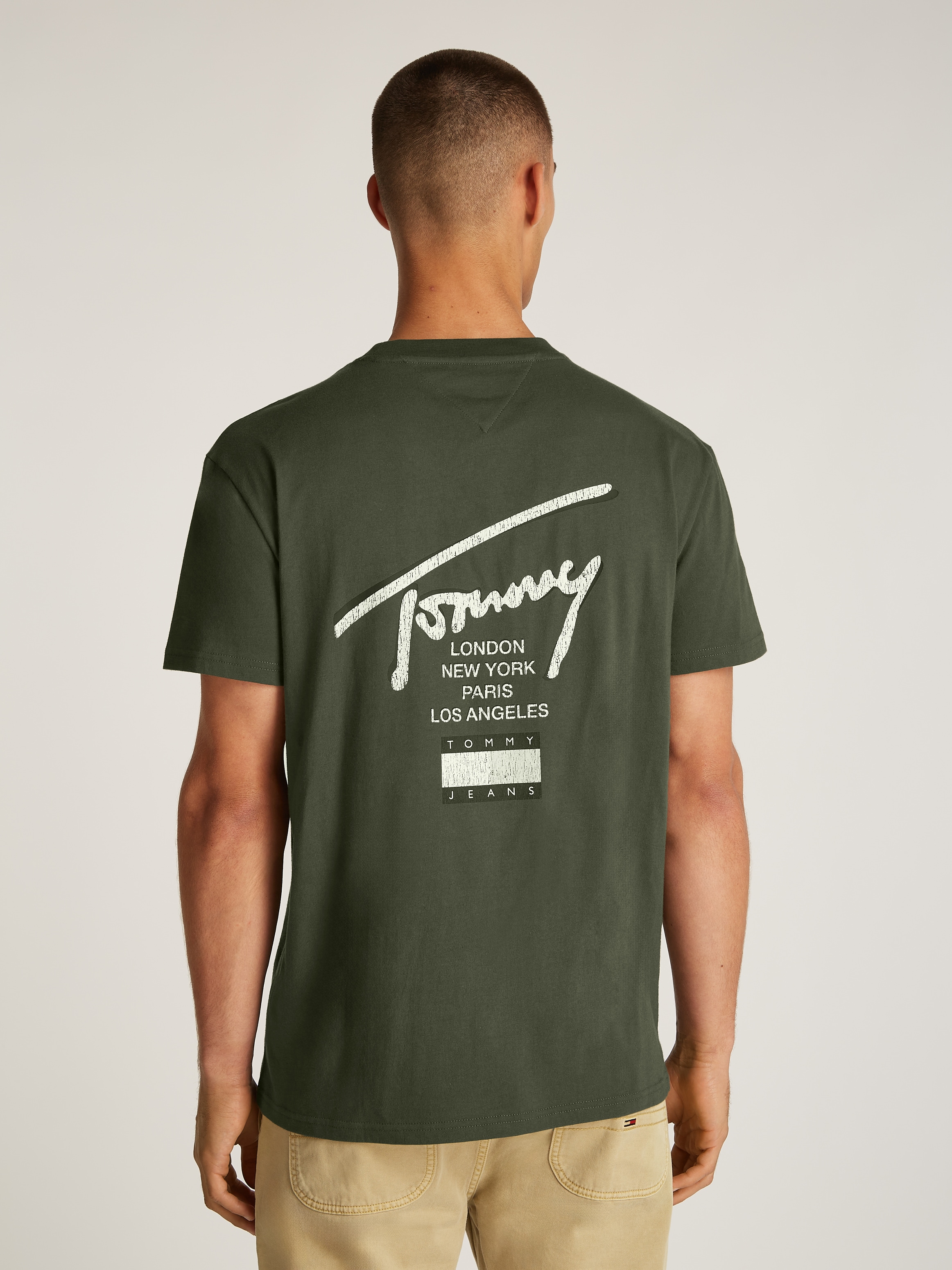 Tommy Jeans T-Shirt »TJM REG TOMMY SIGN CITY TEE EXT«, mit großem Logo am Rücken