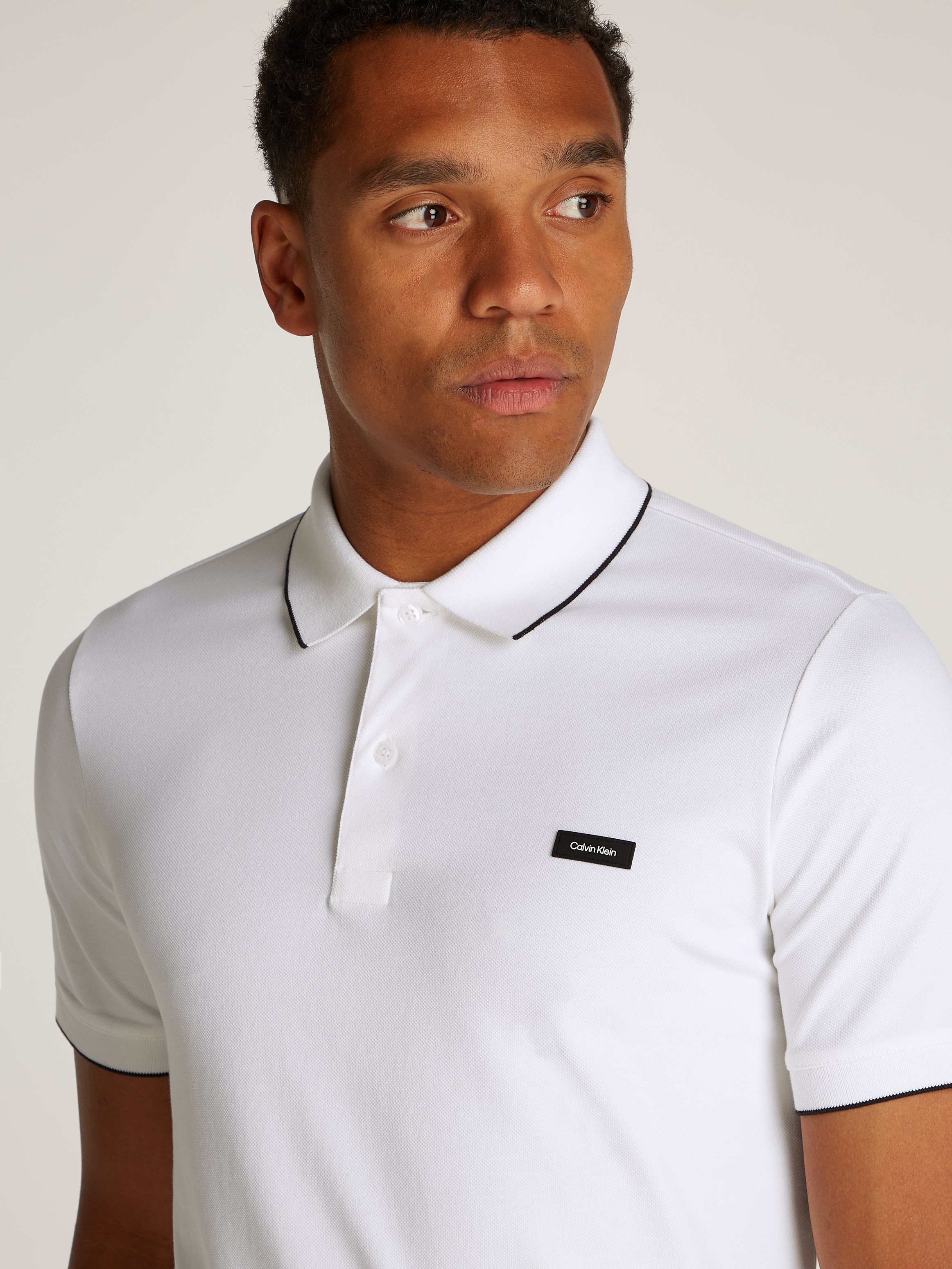 Calvin Klein Poloshirt »STRETCH PIQUE TIPPING POLO«, mit Streifendetail am Kragen