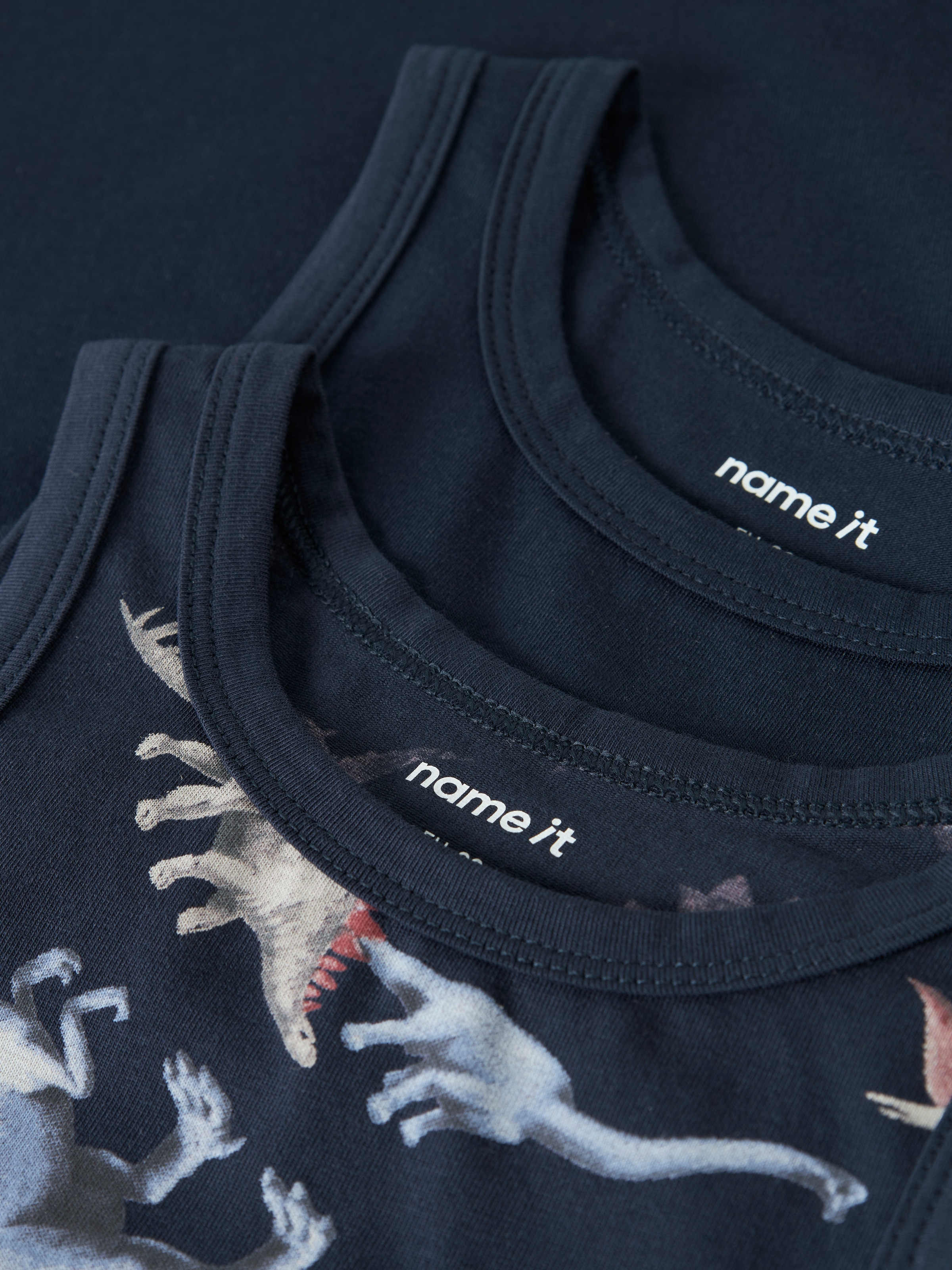 Name It Unterhemd »NMMTANK TOP 2P NAVY DINO NOOS« Packung, 2 Stk. Baumwollmischung, uni und bedruckt im Set