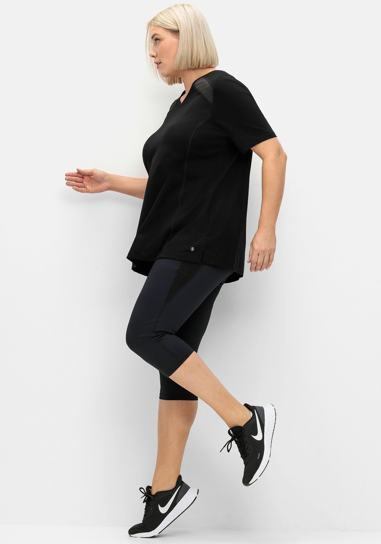 Sheego Leggings »Sportleggings in Caprilänge, aus Funktionsmaterial«