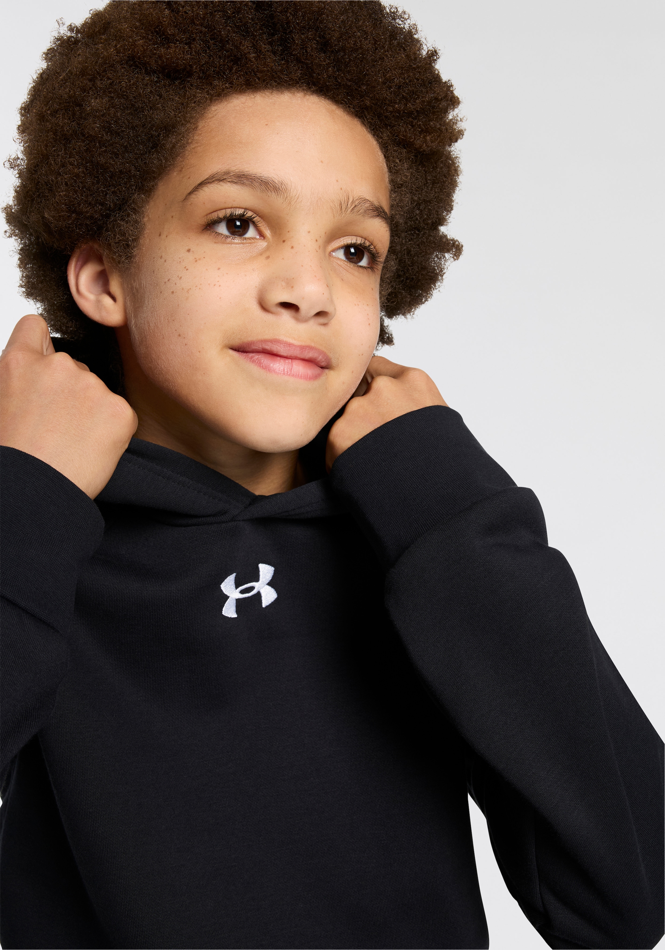 Under Armour® Kapuzensweatshirt »Rival«, mit Bündchen am Rumpfabschluss, hoch geschlossener Ausschnitt
