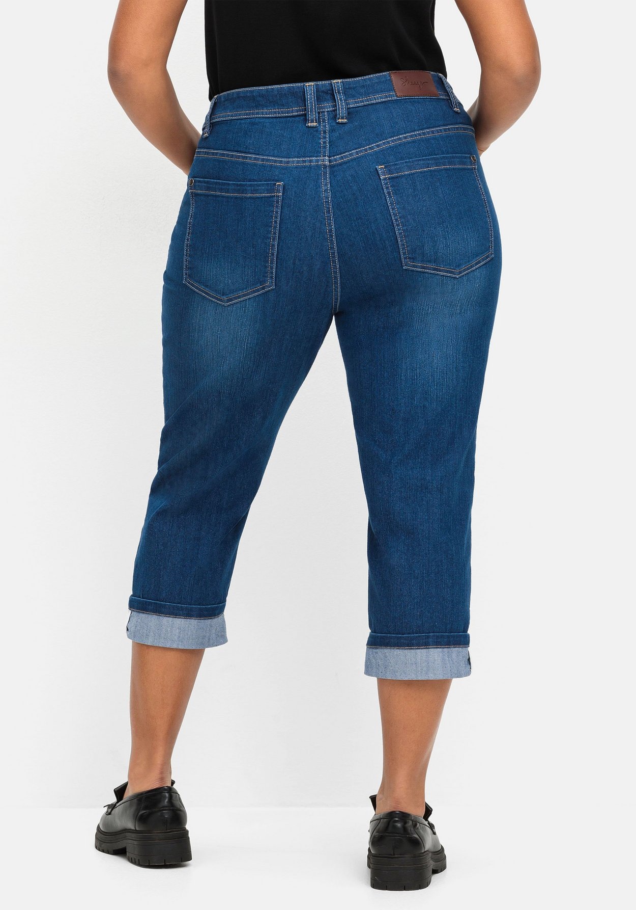 Sheego Stretch-Jeans »Schmale 7/8-Jeans mit Kontrasttape innen am Saum«