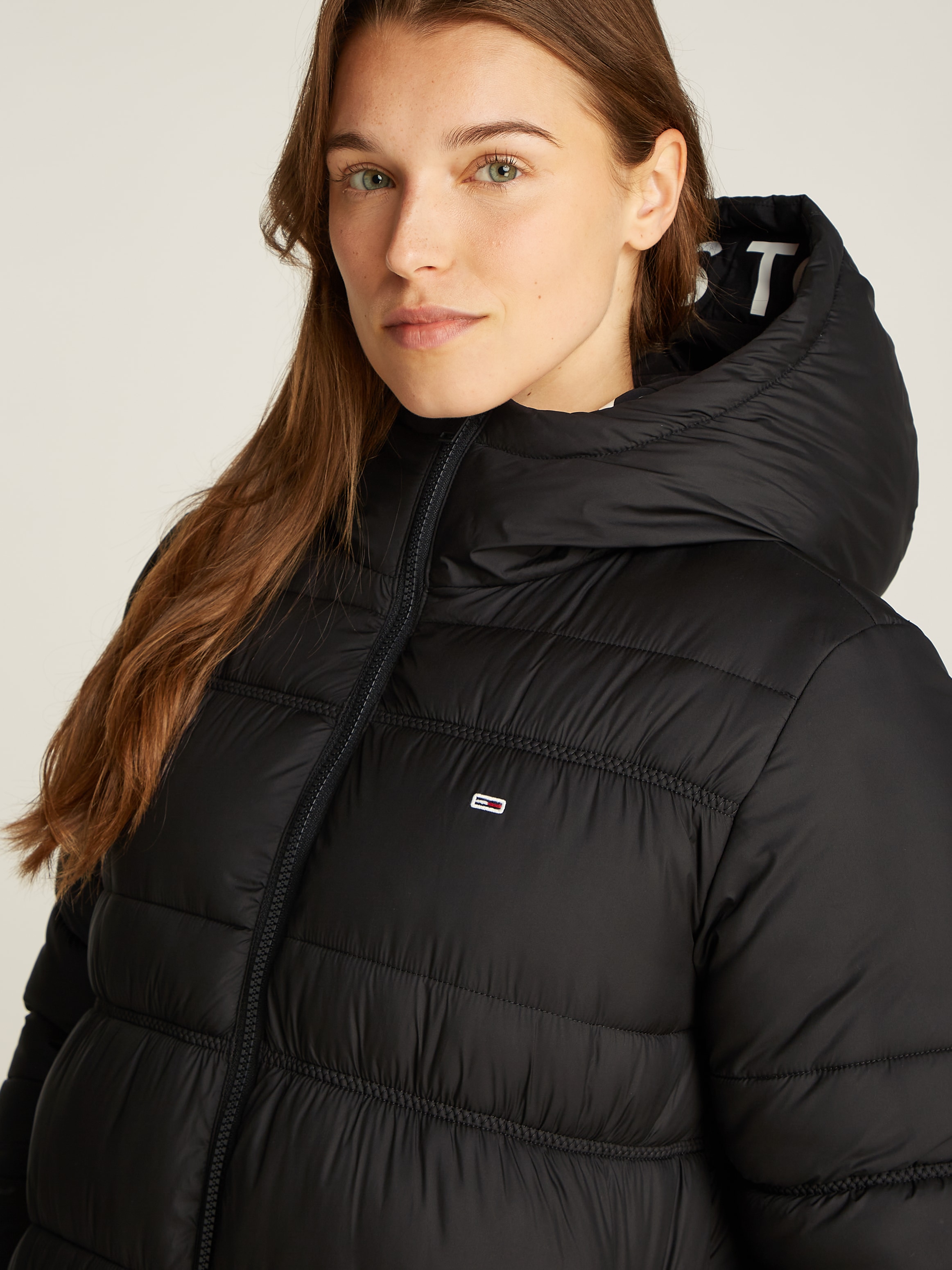 Tommy Jeans Langmantel, mit Logoschriftzug