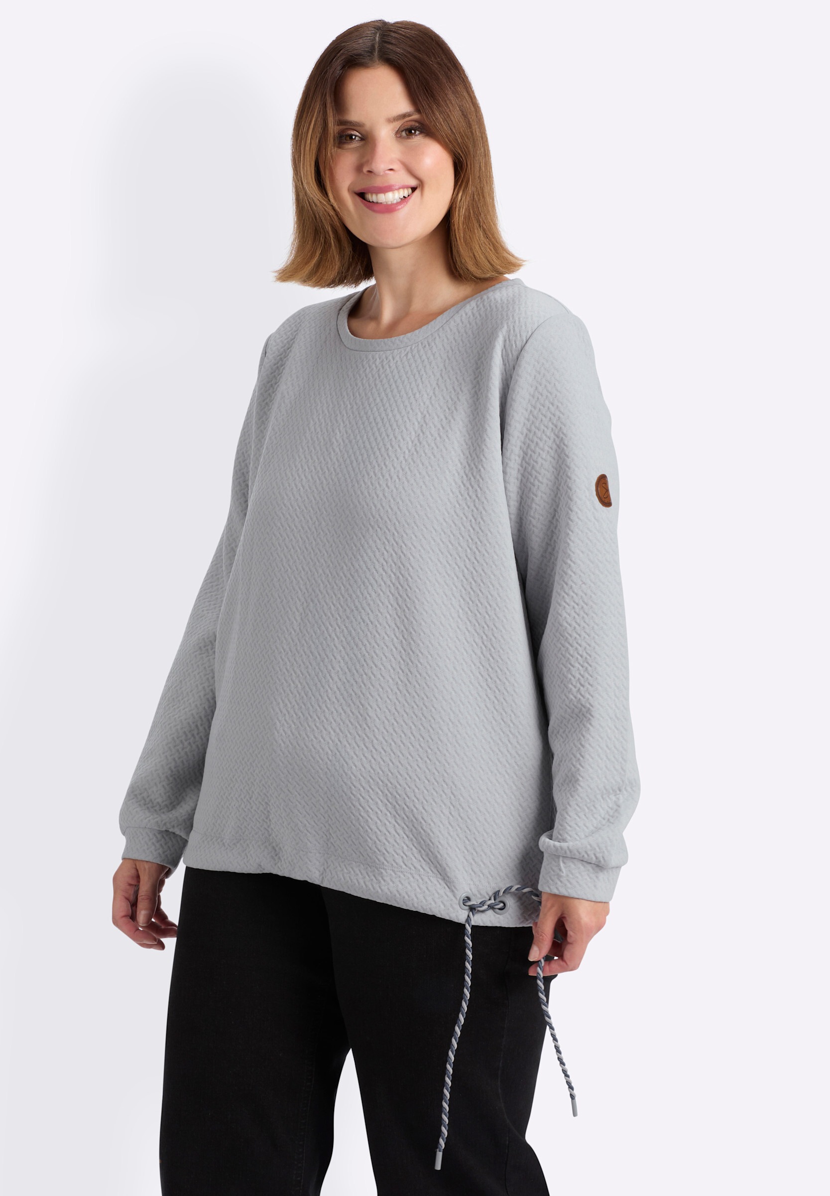 Sheego Sweatshirt »Sweatshirt Sweatshirt mit Ösen und gedrehtem Garn«
