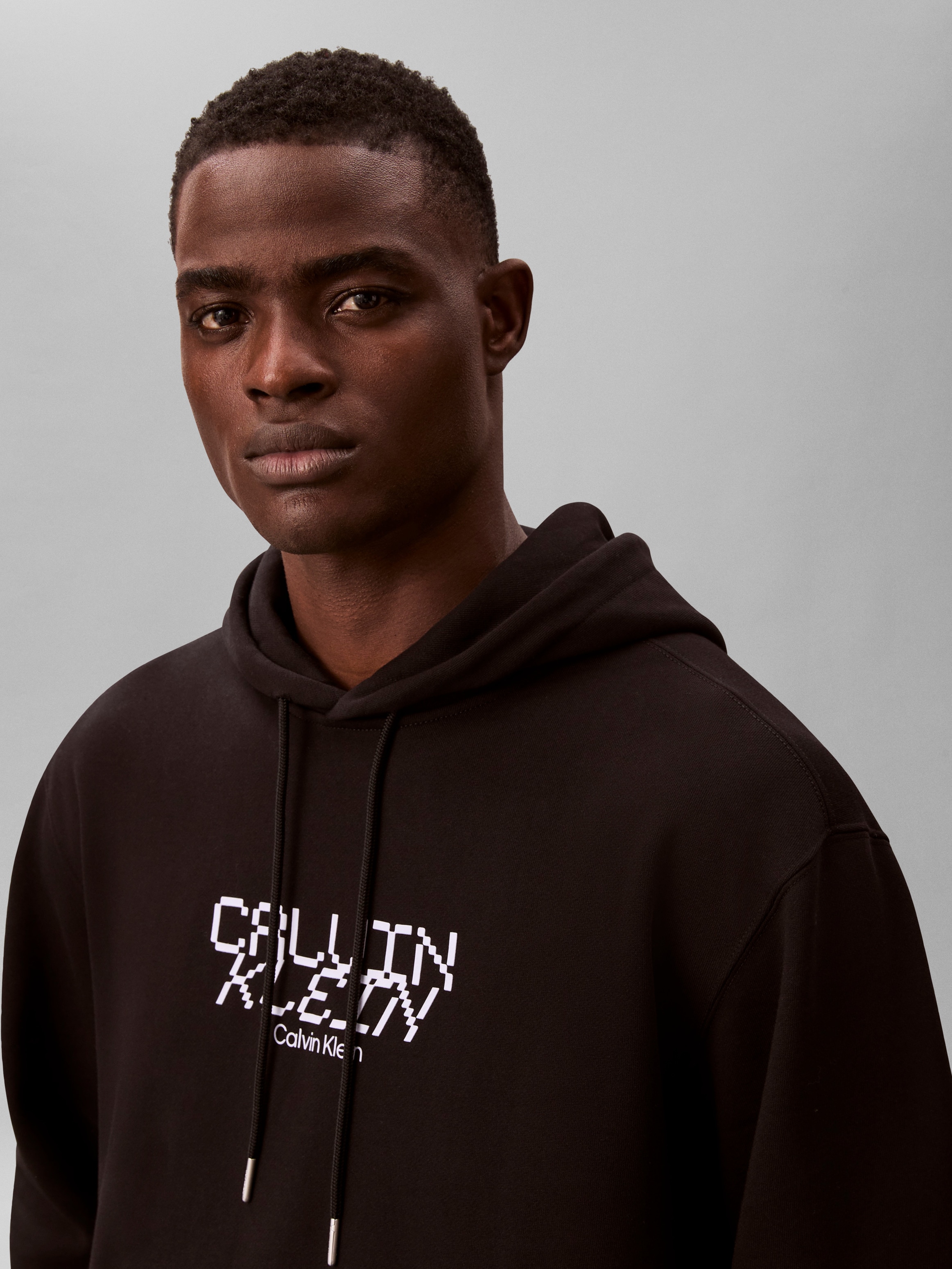 Calvin Klein Kapuzensweatshirt , Regular Fit, Kängurutasche, Logo-Schriftzug
