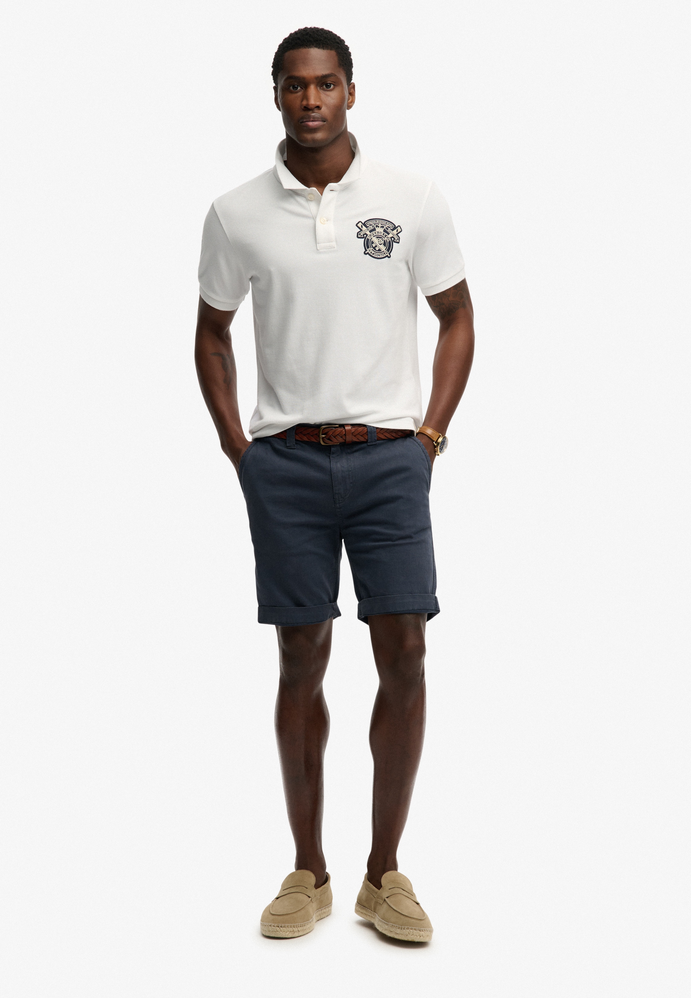 Superdry Poloshirt »CREST POLO« mit Markenlabel, aus Baumwolle, Relaxed Fit, bedruckte Optik