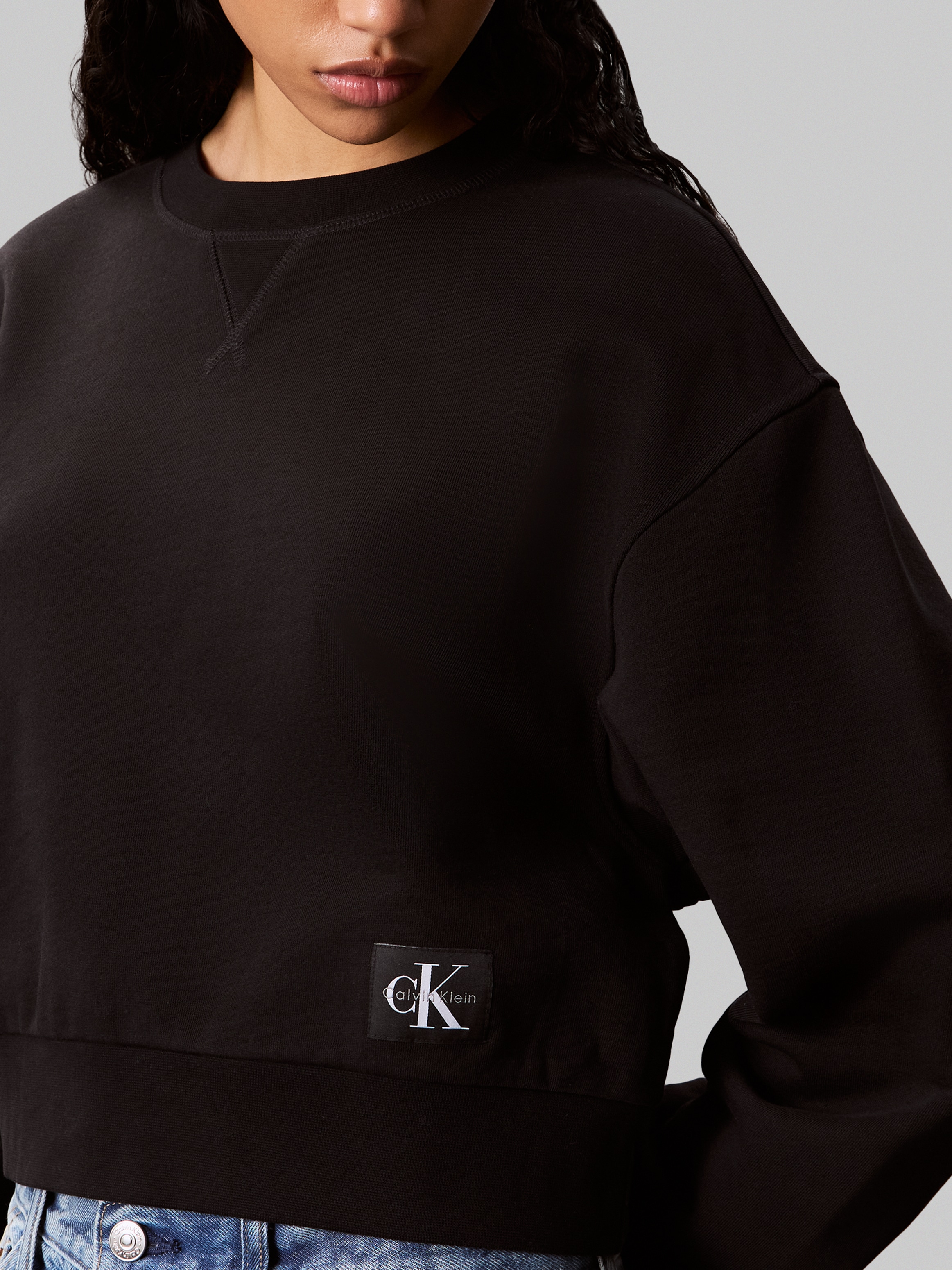 Calvin Klein Jeans Sweatshirt »FRENCH TERRY WOVEN LABEL CREW«, Regular fit mit Rundhalsausschnitt
