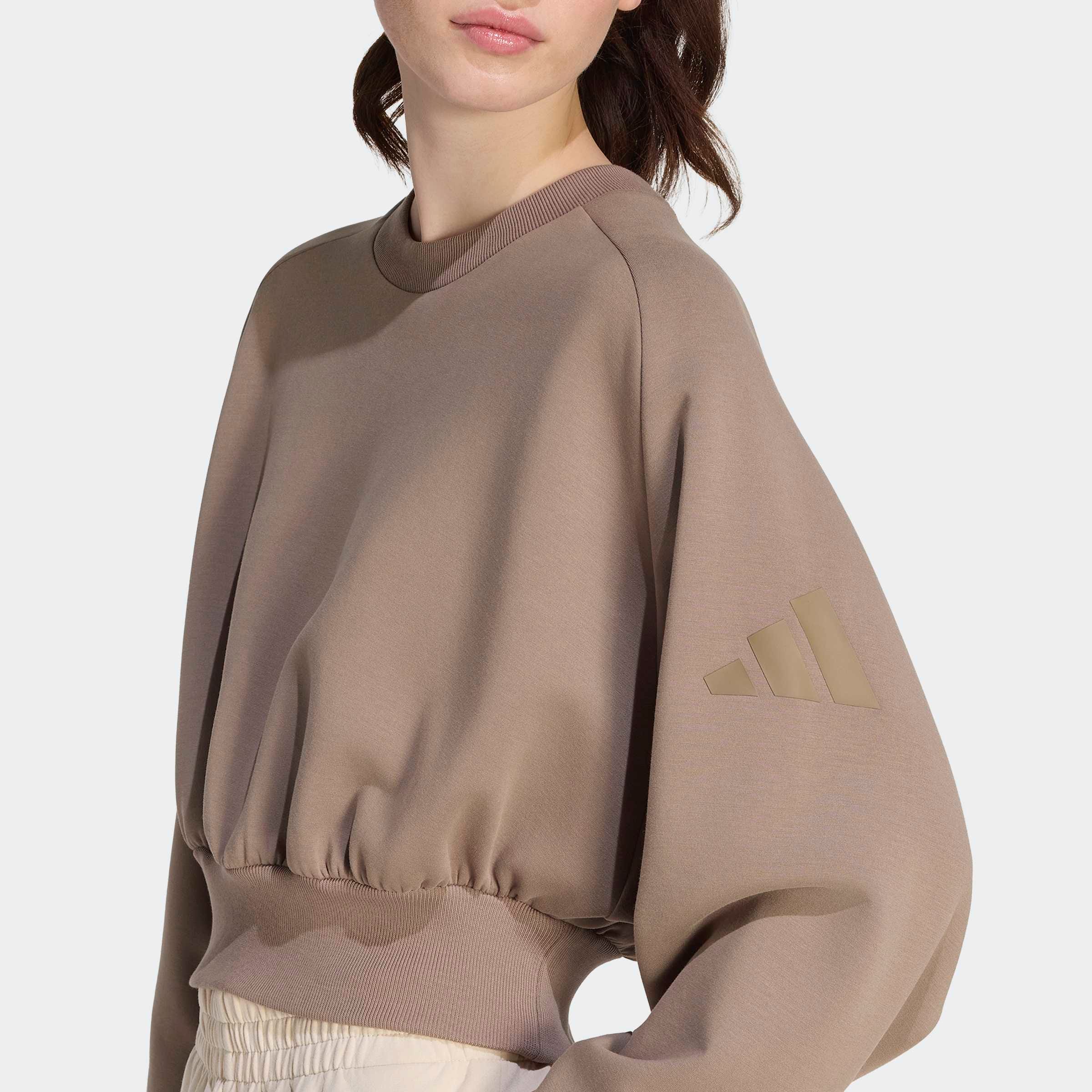 adidas Sportswear Sweatshirt »W ALL SZN SL SW«, mit angesetztem Bündchen, aus weichem, leichtem Material
