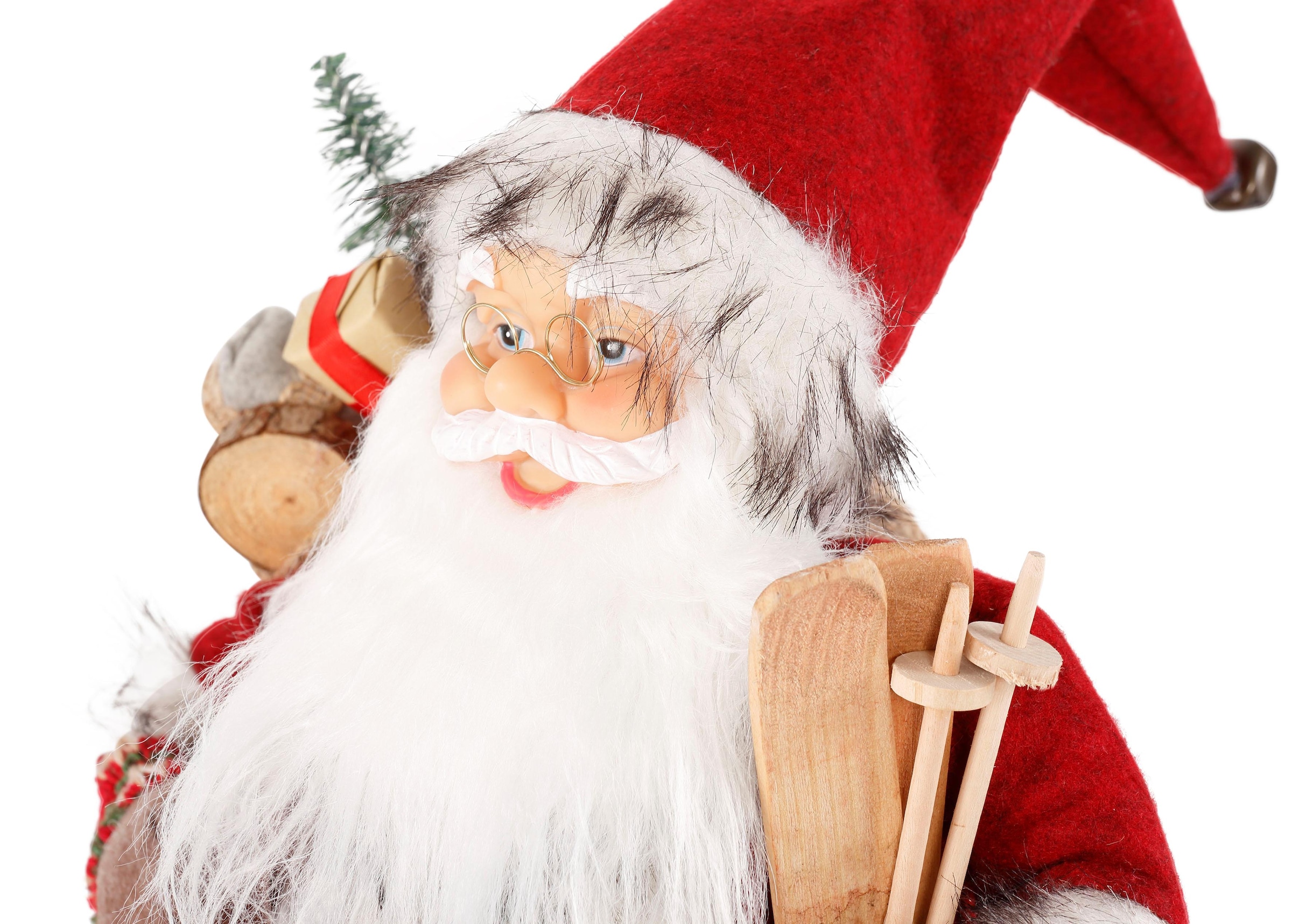 HOSSNER - HOMECOLLECTION Weihnachtsmann »Santa mit Skiern unter dem Arm und  Geschenken«, Weihnachtsdeko, Dekofigur, Weihnachtsfigur auf Rechnung kaufen