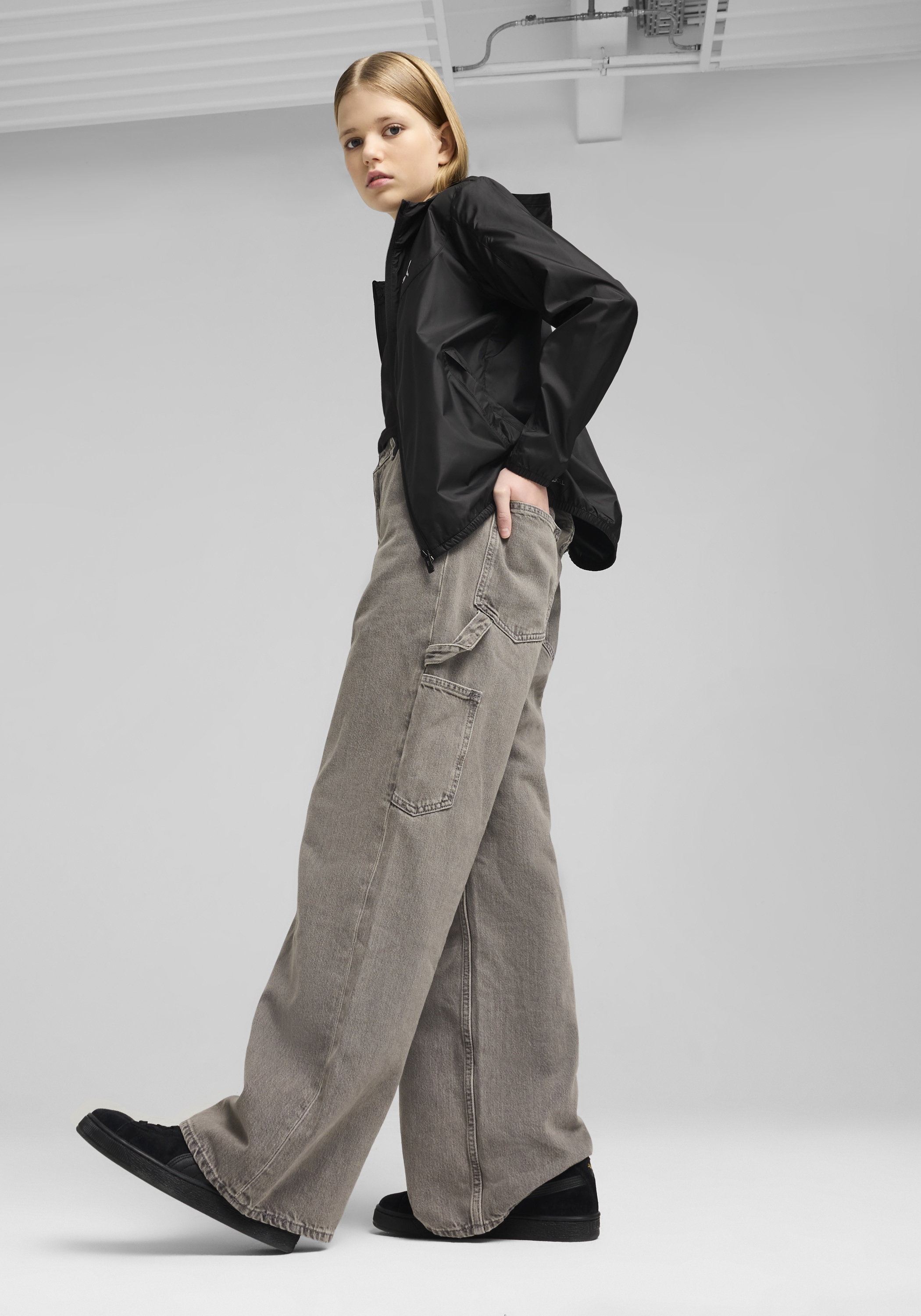 PUMA Windbreaker »ESS REGULAR WINDBREAKER« mit Kapuze für Jugendliche, mit Kapuze, mit Eingrifftasche