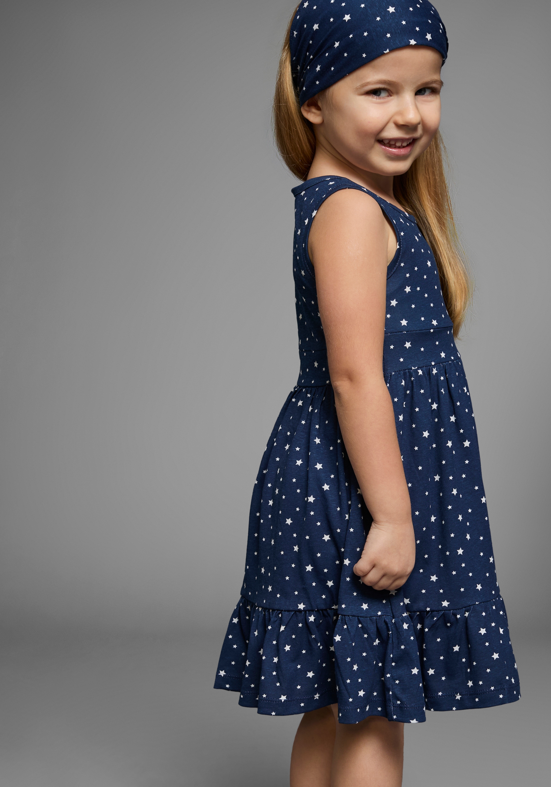 KIDSWORLD Jerseykleid »2tlg. Shirtkleid + Haarband im niedlichen Sternen-Allover«, (Set, 2 tlg.), festliche Anlässe, knielang, verspielter Stil, aus Baumwolle