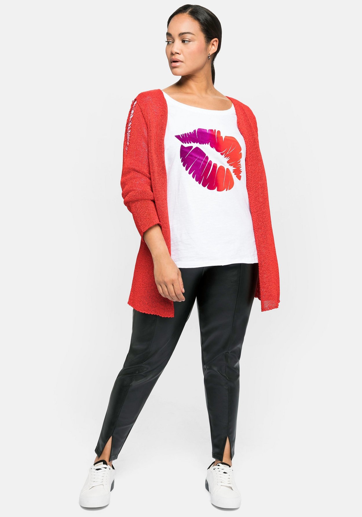 Sheego Leggings »Leggings in Lederoptik, mit Schlitz am Saum«