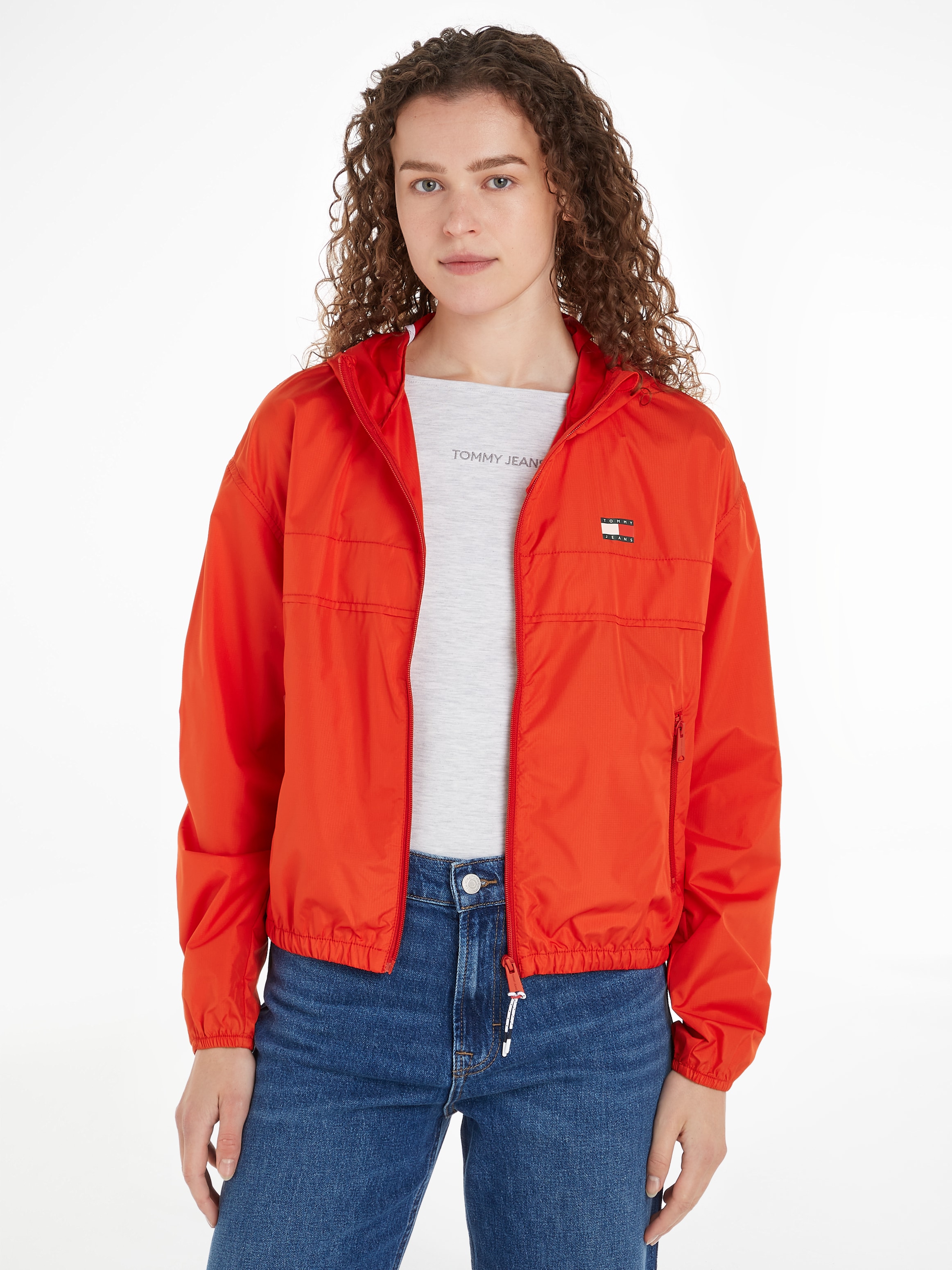 Tommy Jeans Windbreaker »TJW CRP LT CHICAGO«, in modischer Cropped Form