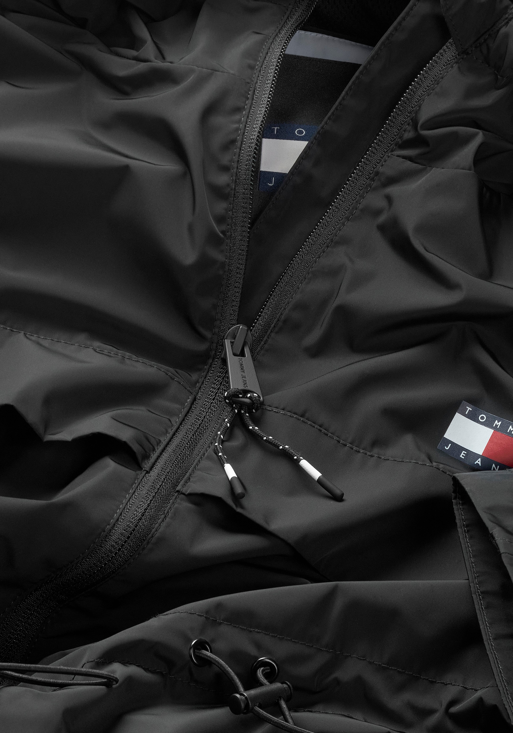 Tommy Jeans Windbreaker »TJW CHICAGO WAISTED COAT EXT«, mit Kapuze, mit Tommy Jeans Markenlabel