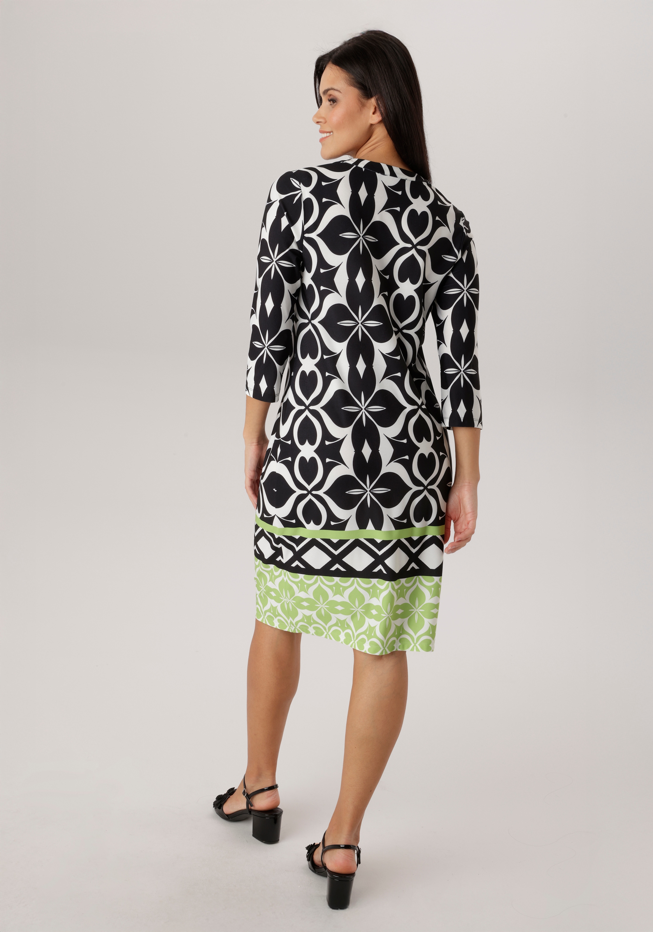 Aniston SELECTED Jerseykleid mit gemusterter Bordüre und grünem Kontrast am Saum - NEUE KOLLEKTION