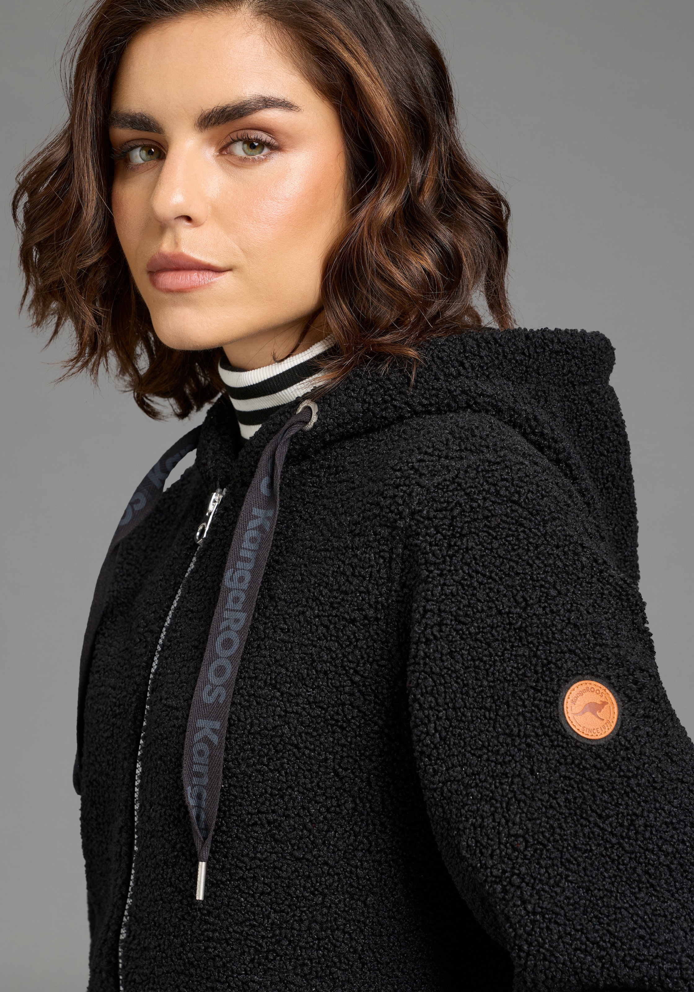 KangaROOS Fleecejacke mit Kapuze Teddy Fleece lang mit Kapuze für den Übergang
