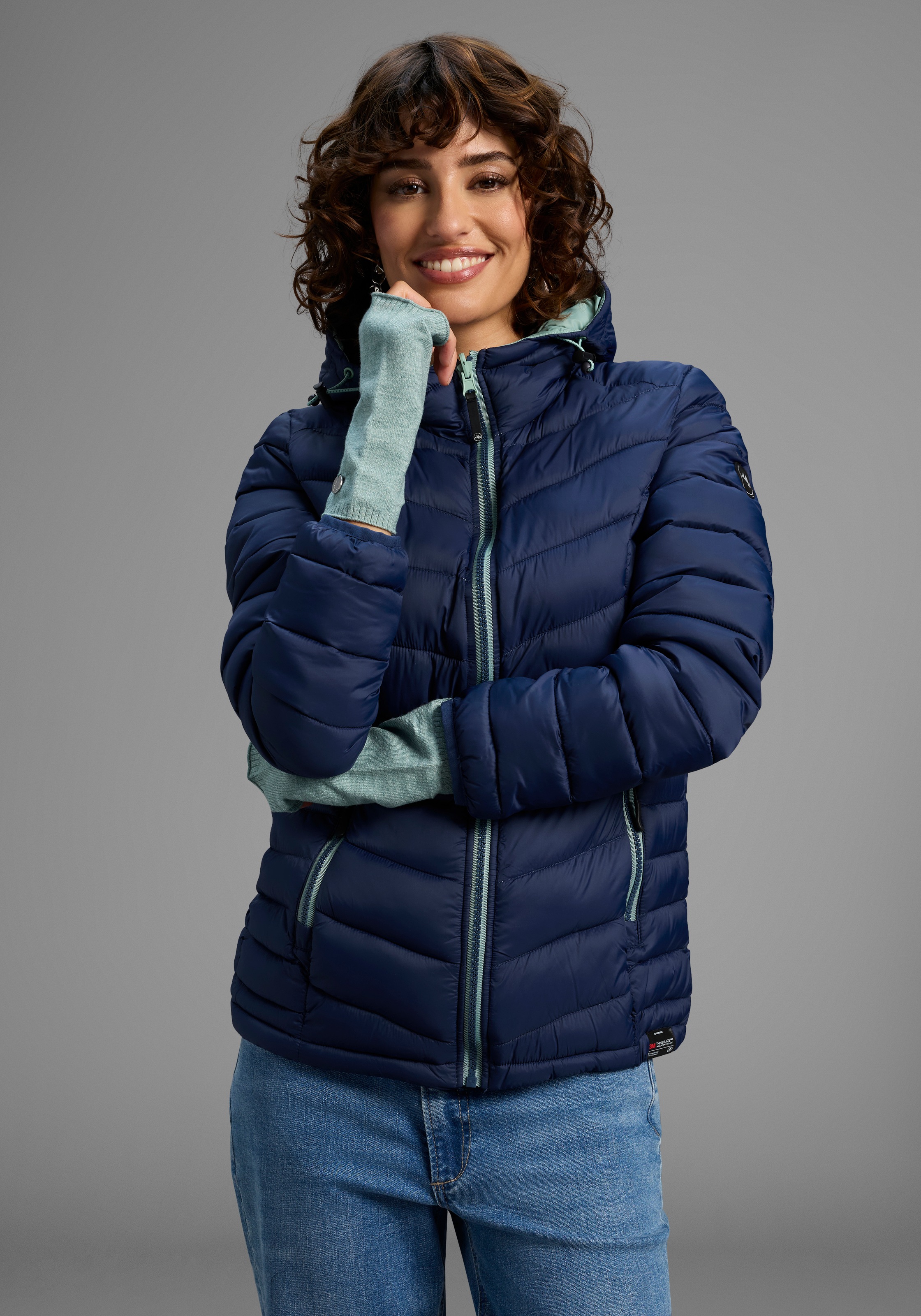 Laura Scott, Damen, Armstulpen 2 Stk. aus kuscheligem Strick mit süßem Metall-Badge - NEW, grün melange, grün melange, Handstulpen mit Daumenloch für 