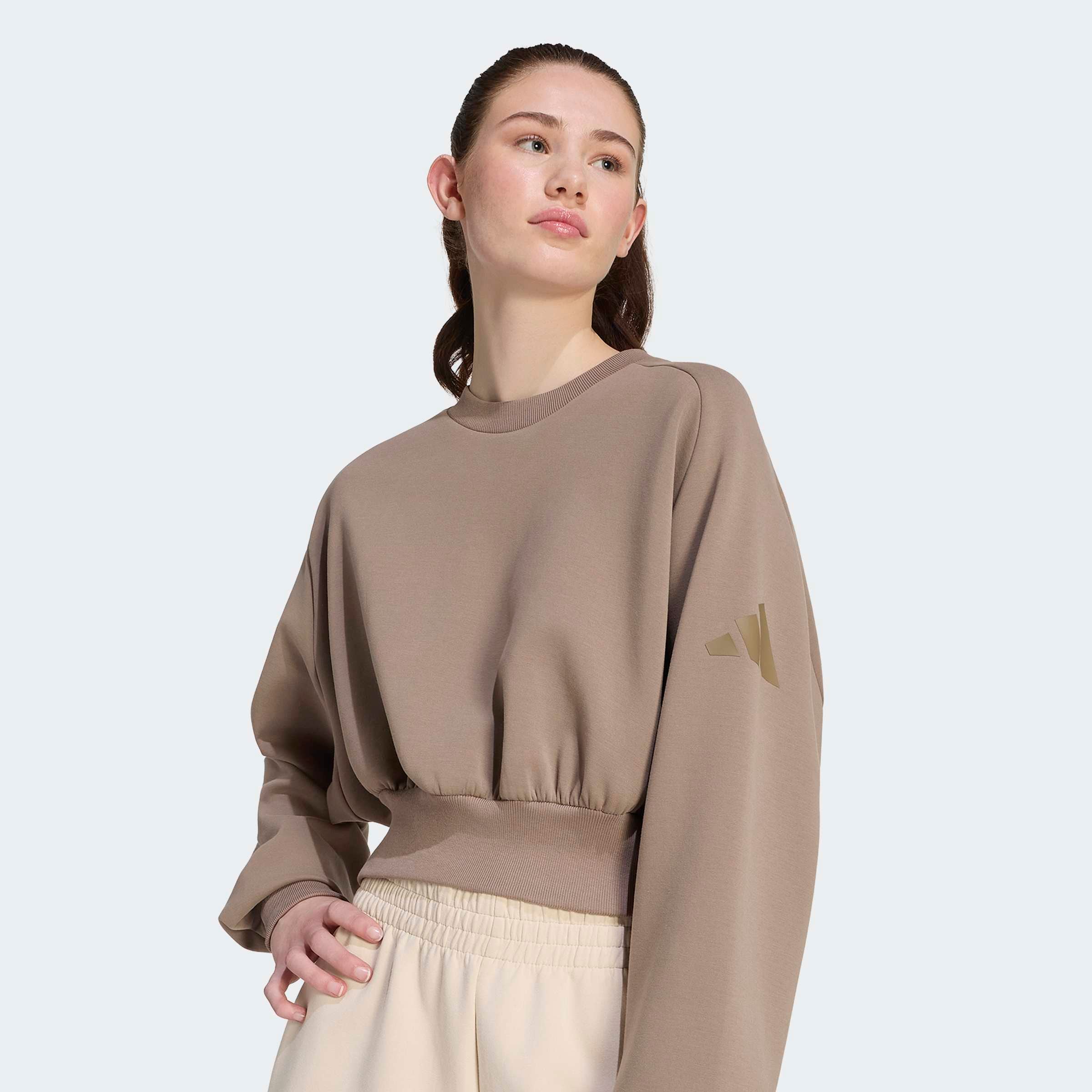 adidas Sportswear Sweatshirt »W ALL SZN SL SW«, mit angesetztem Bündchen, aus weichem, leichtem Material
