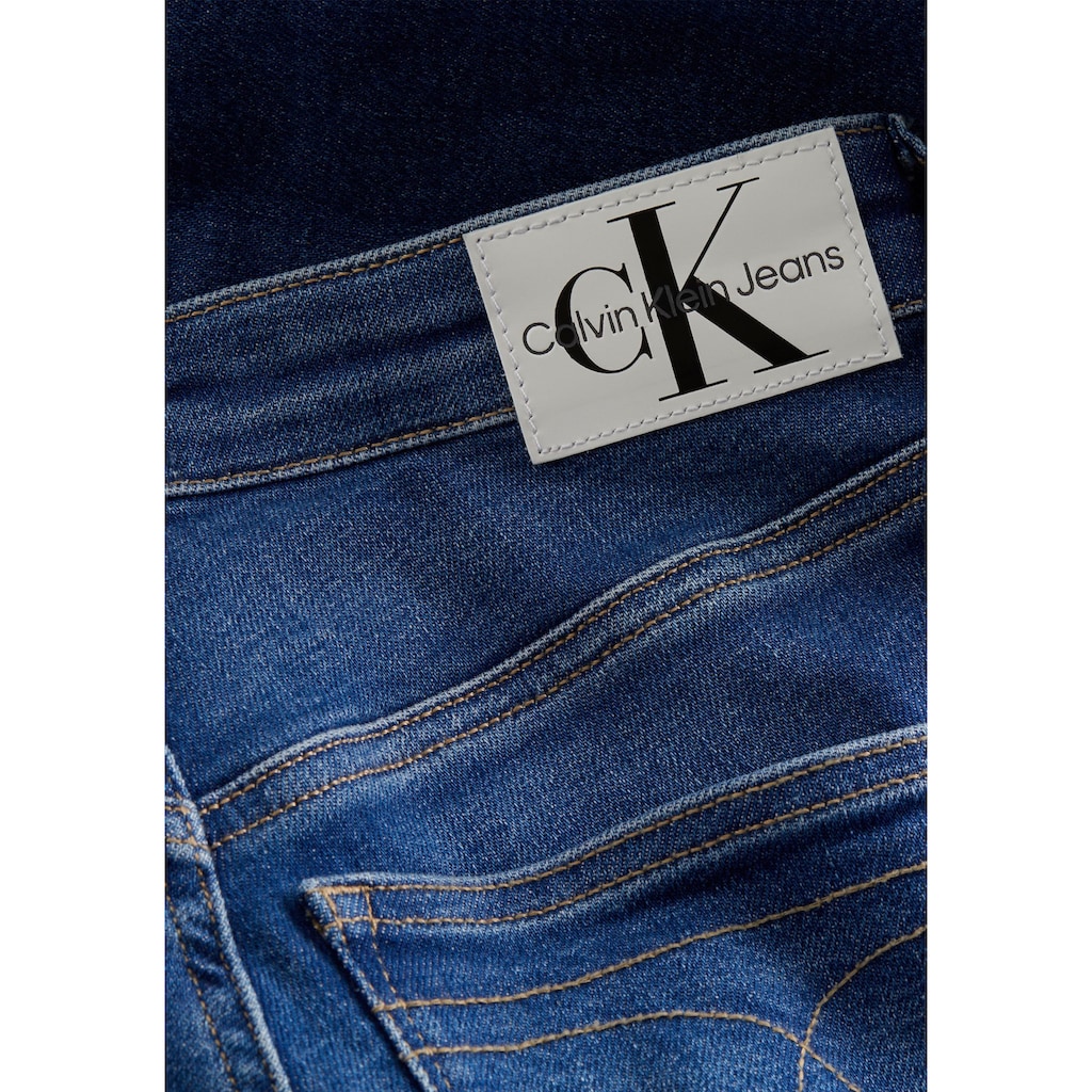 Calvin Klein Jeans Skinny-fit-Jeans »HIGH RISE SKINNY«, mit Calvin Klein Leder-Brandlabel hinten am Bund