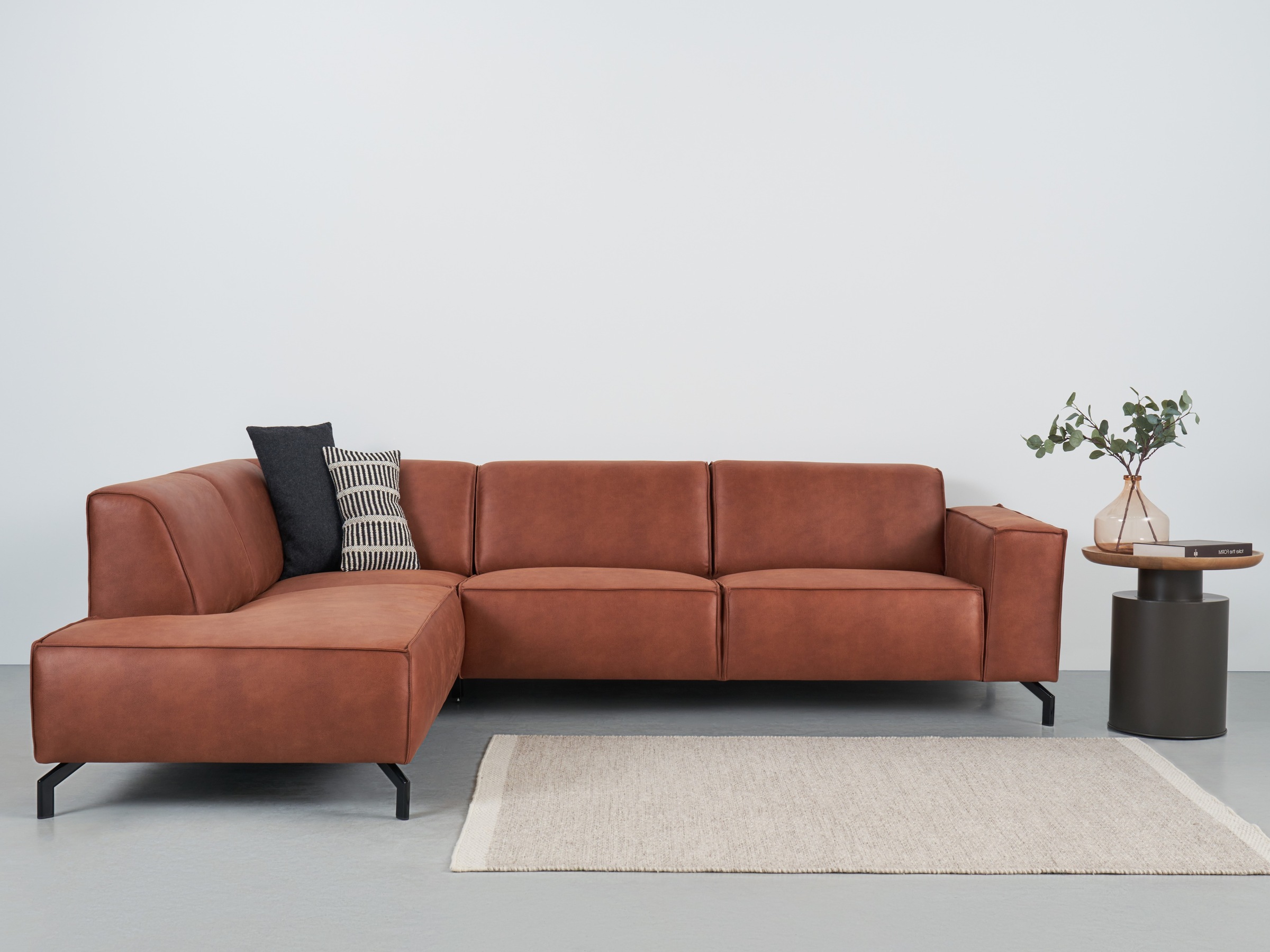 Places of Style Ecksofa Lorcan, in Lederoptik oder Strukturstoff lieferbar