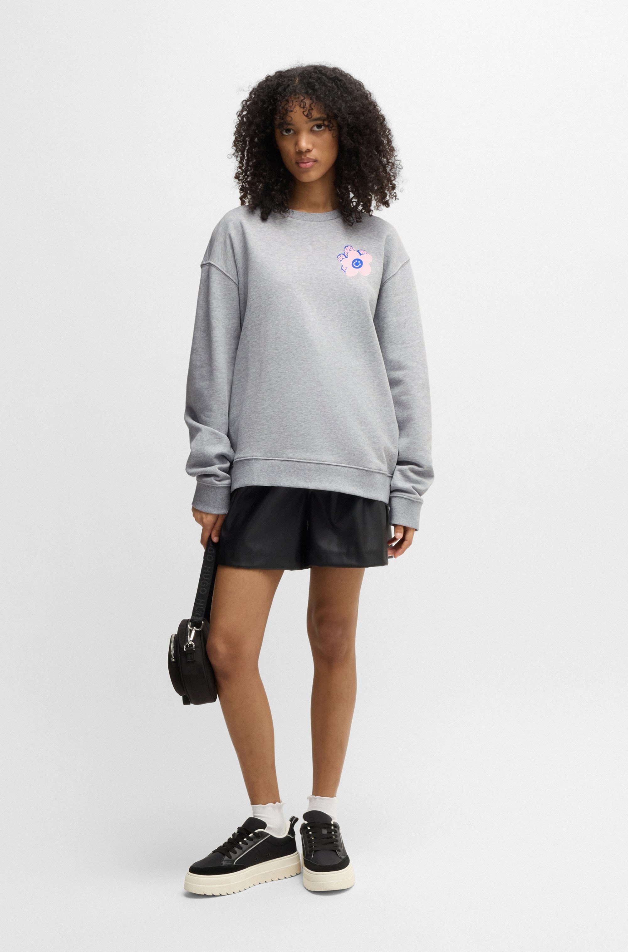 HUGO Blue Sweatshirt »Oversized Crew«, mit Flower Backprint, Straß Logo Print
