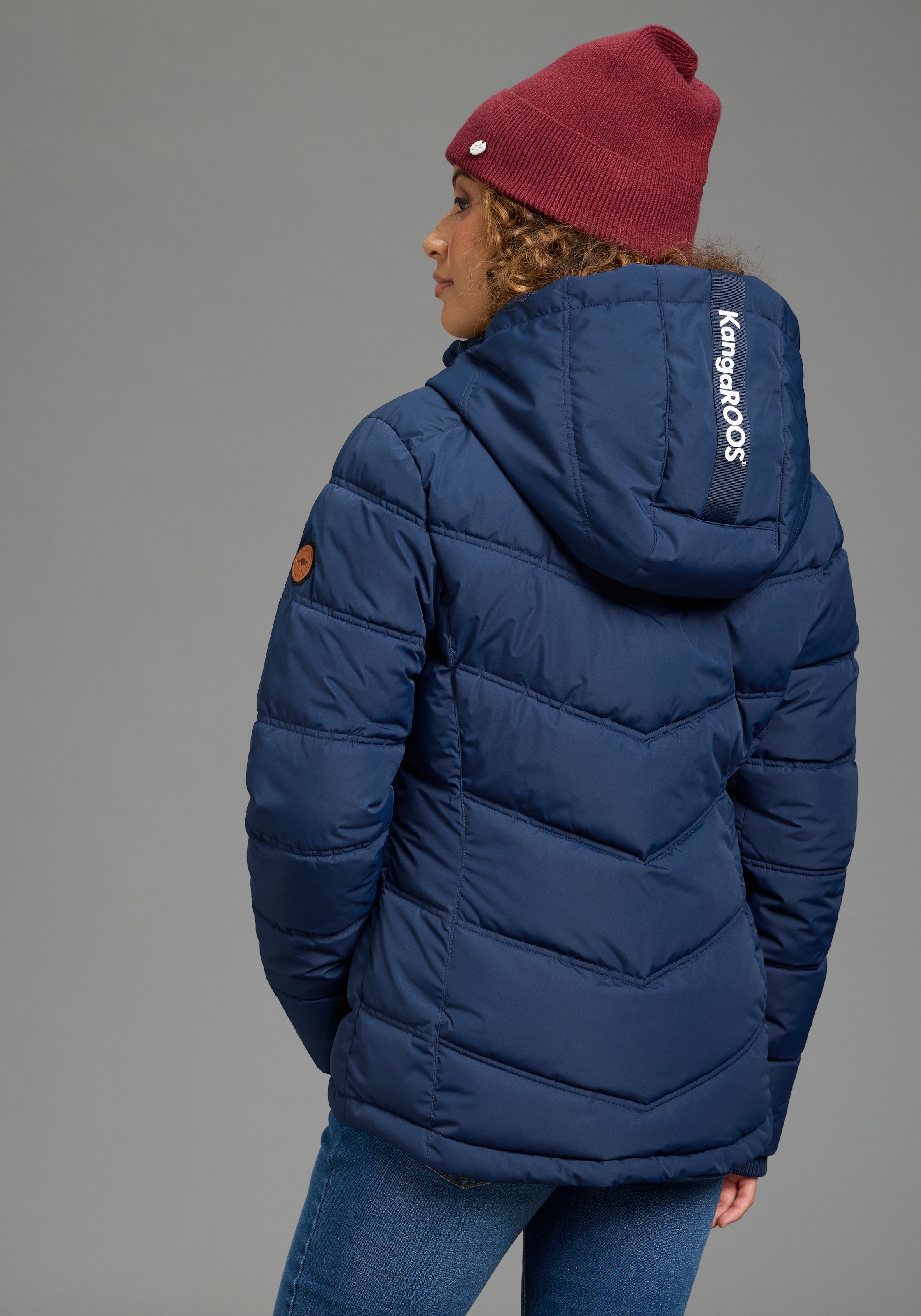 KangaROOS Winterjacke mit Kapuze mit Kapuze und Kordelzug,  Reißverschlusstaschen und Innentasche
